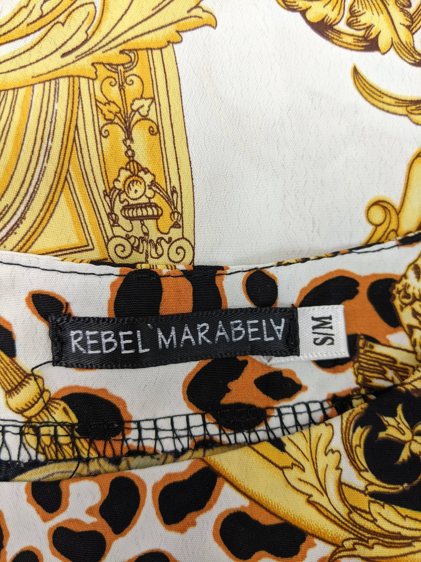 Label of Rebel Marabel leopard and baroque print dress showing brand and size