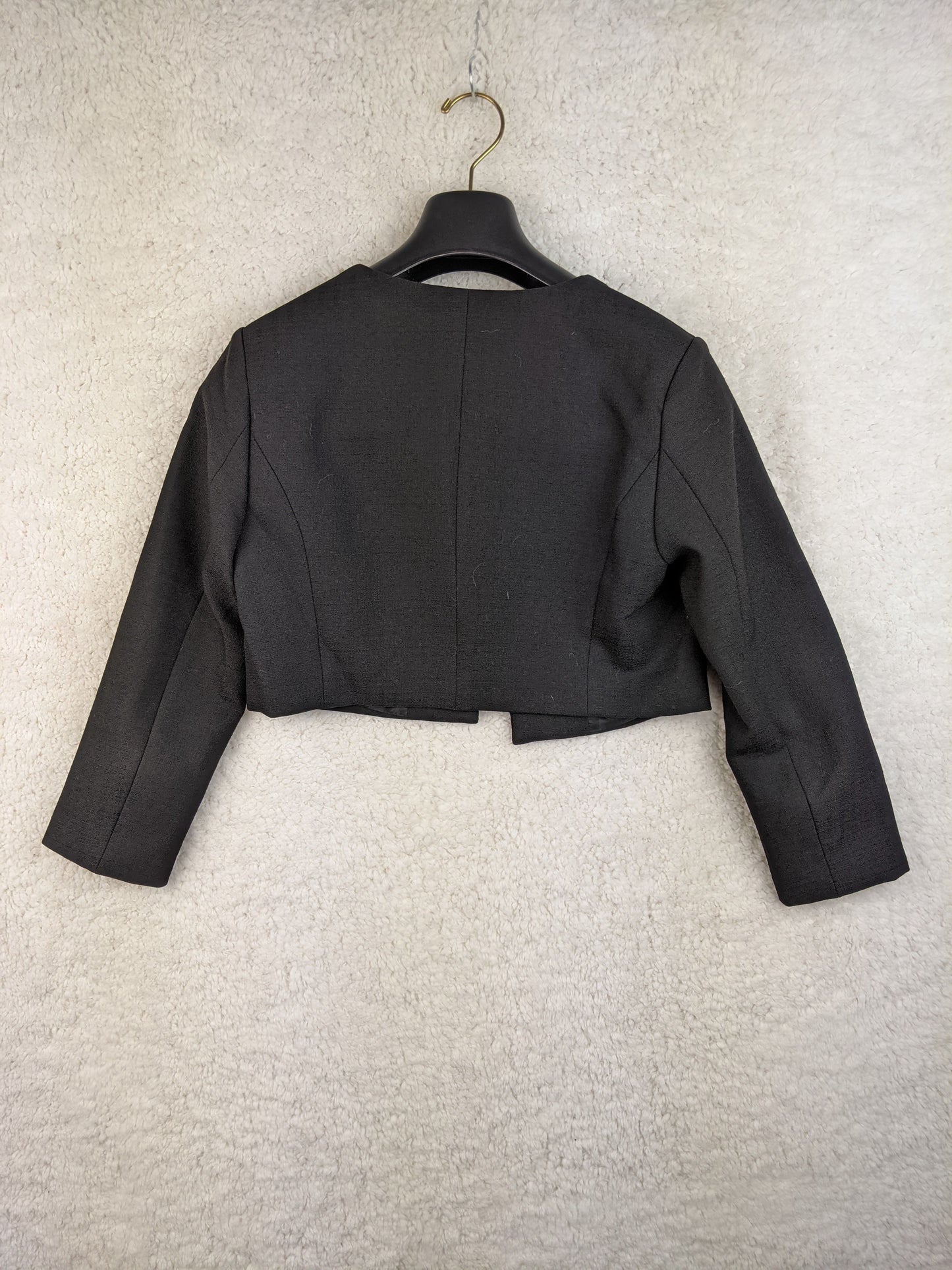 Back view of Oxana black cropped jacket