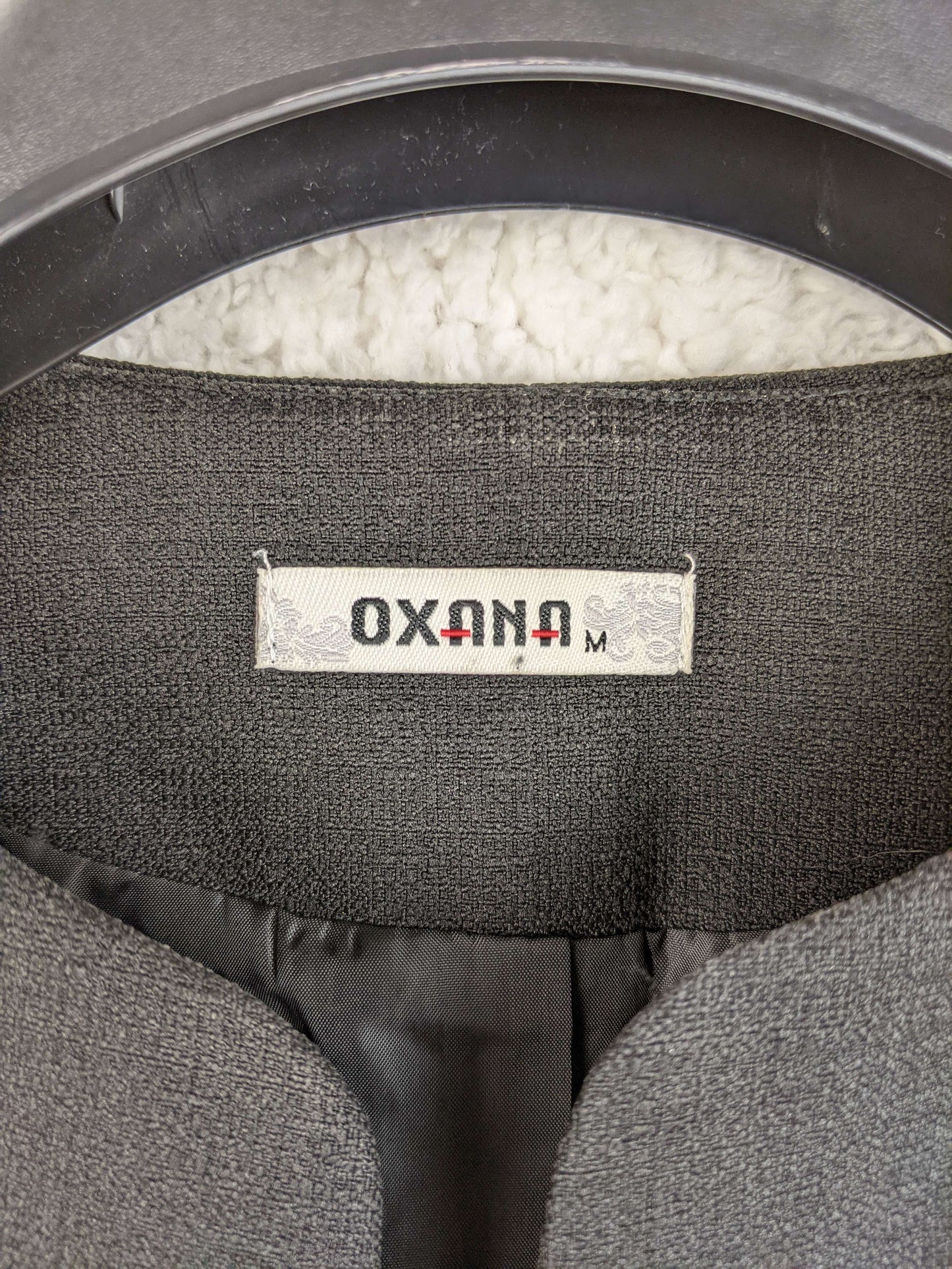 Close-up of Oxana label