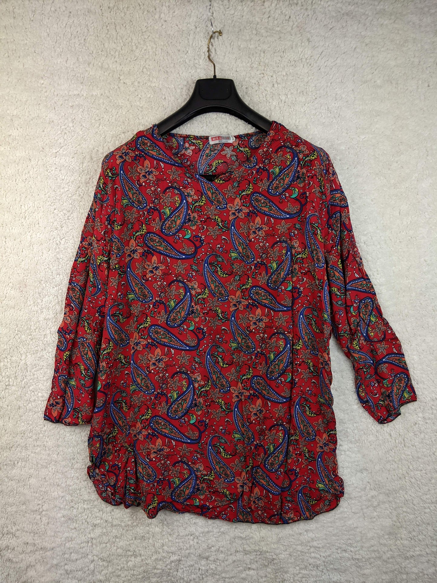 Front view of Meggie vibrant paisley print blouse