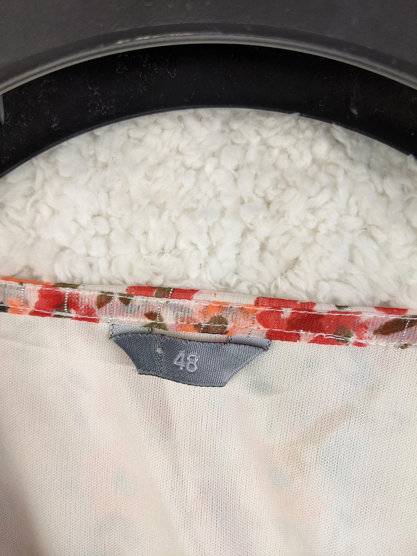 Size label of Zeeman dress showing size 48