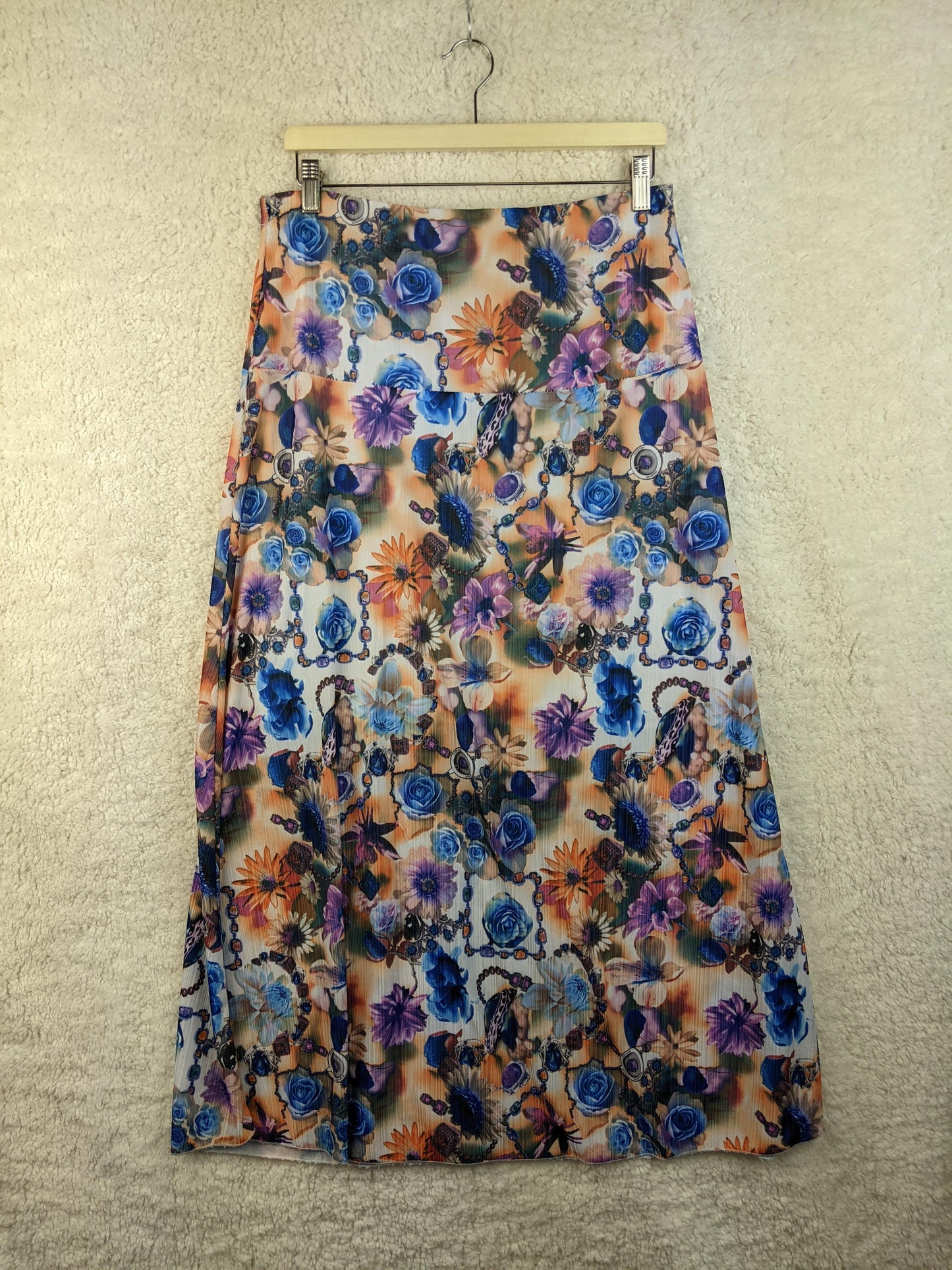 Floral maxi skirt hanging on a hanger
