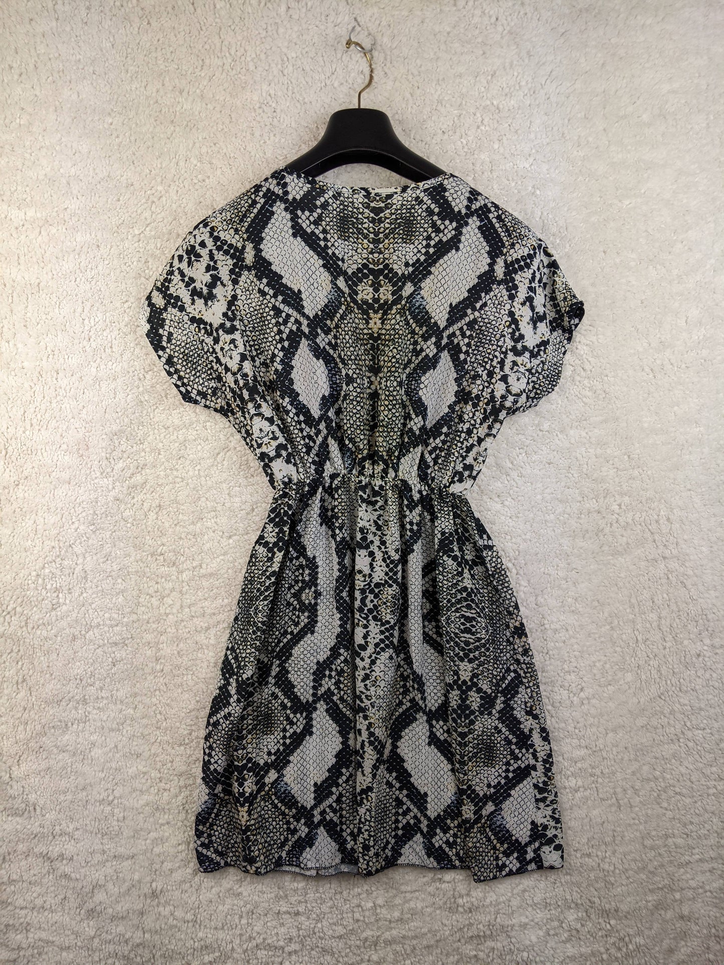 Back view of snakeskin print wrap dress