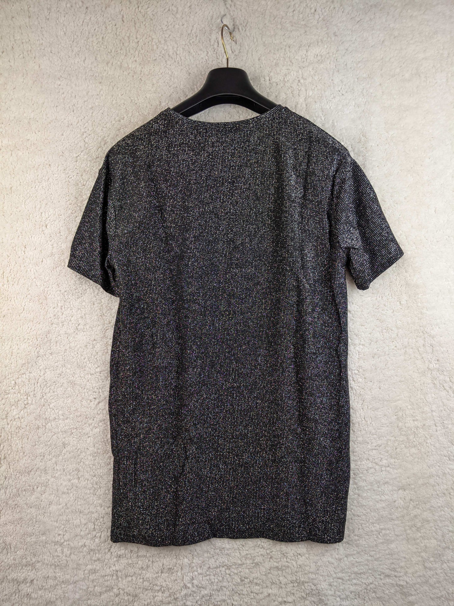 Back view of a black Zara Trafaluc sparkle T-shirt