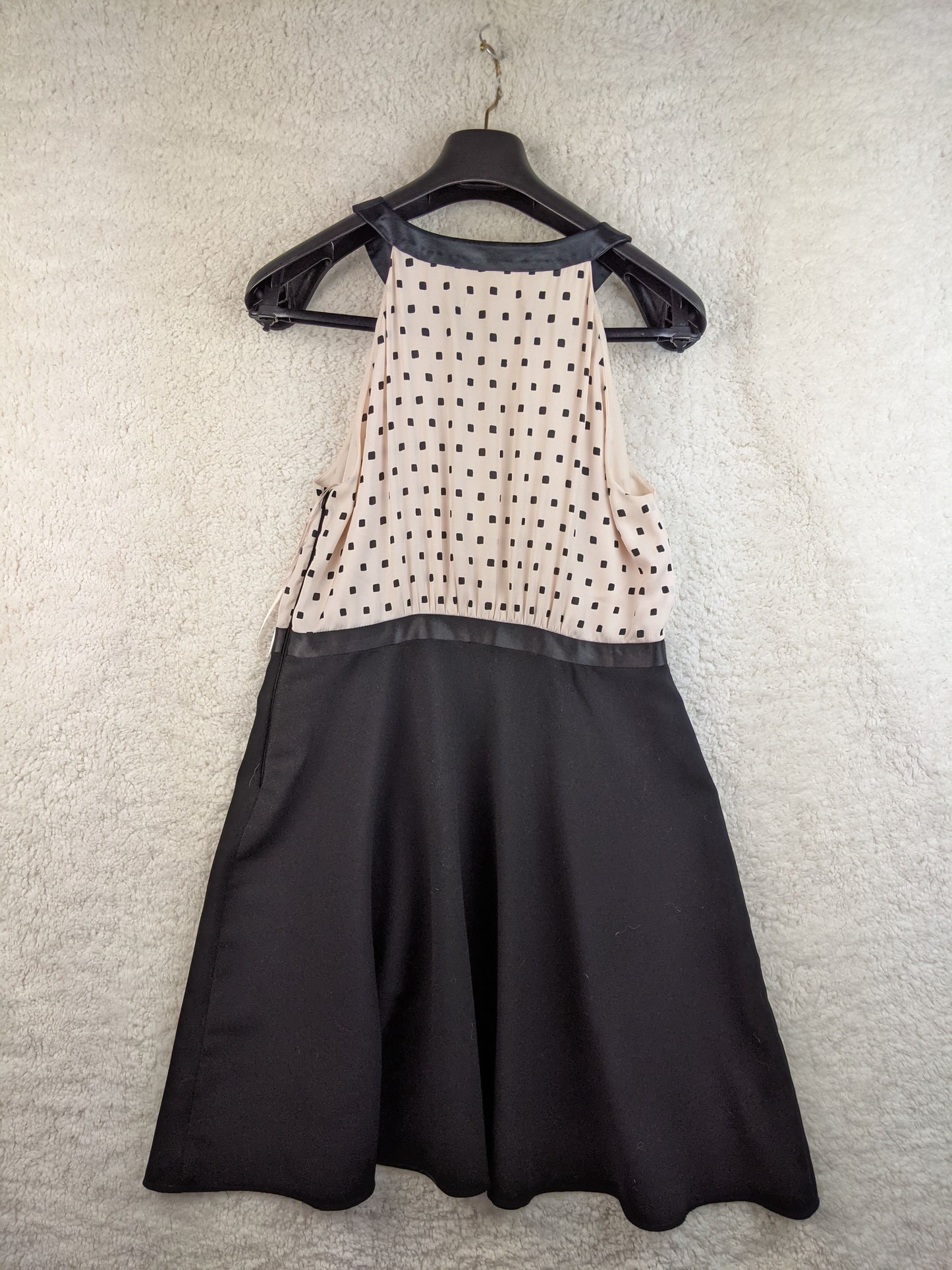 Back view of Steps polka dot halter dress