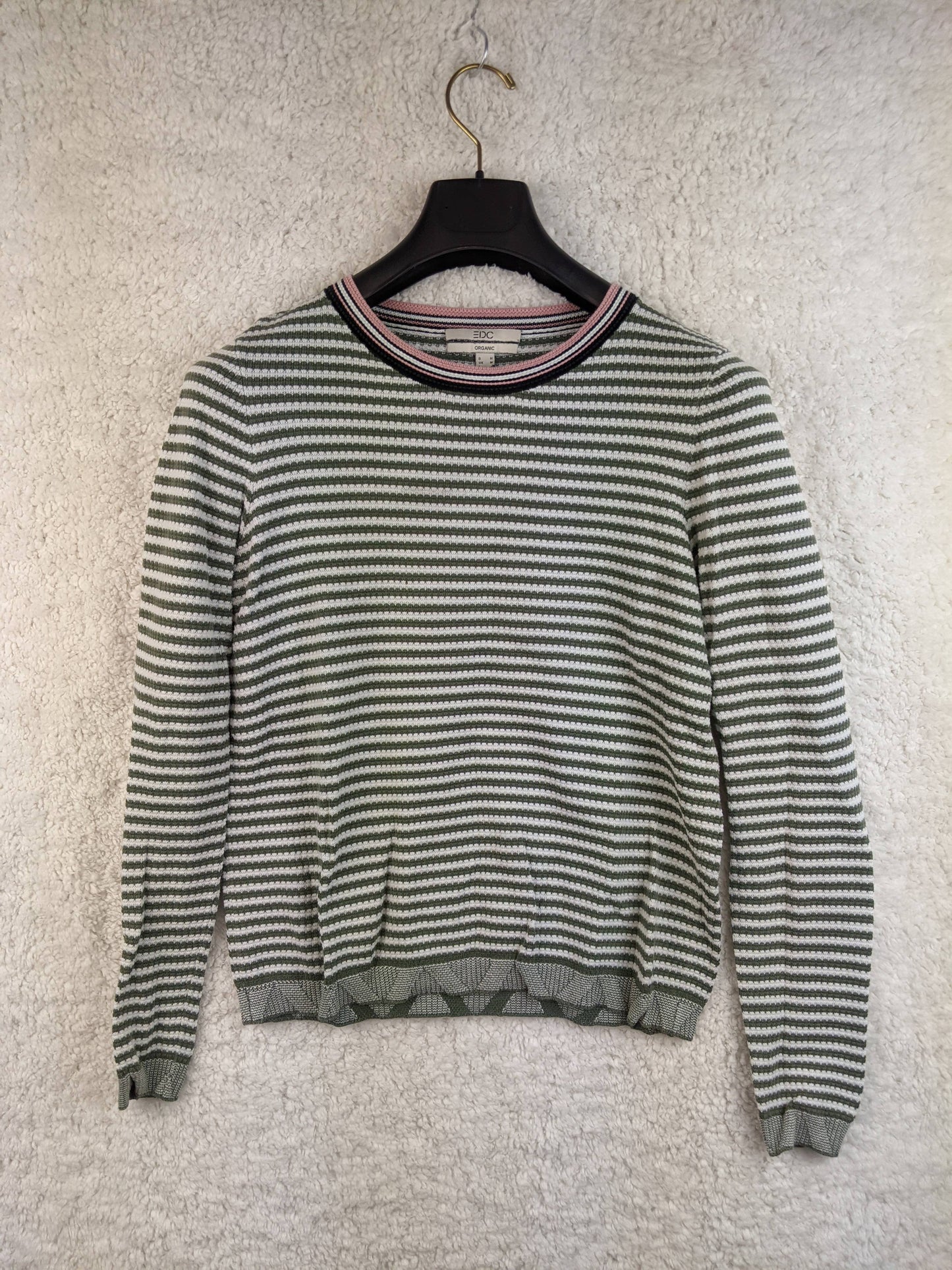 Front view of EDC green striped sweater