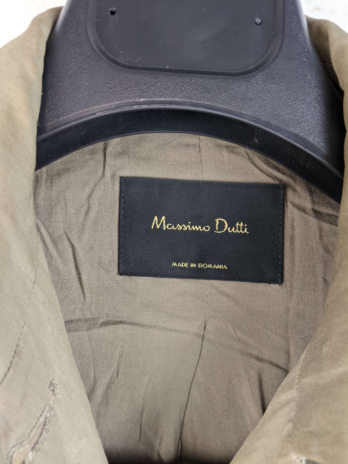 Close-up of Massimo Dutti label inside jacket