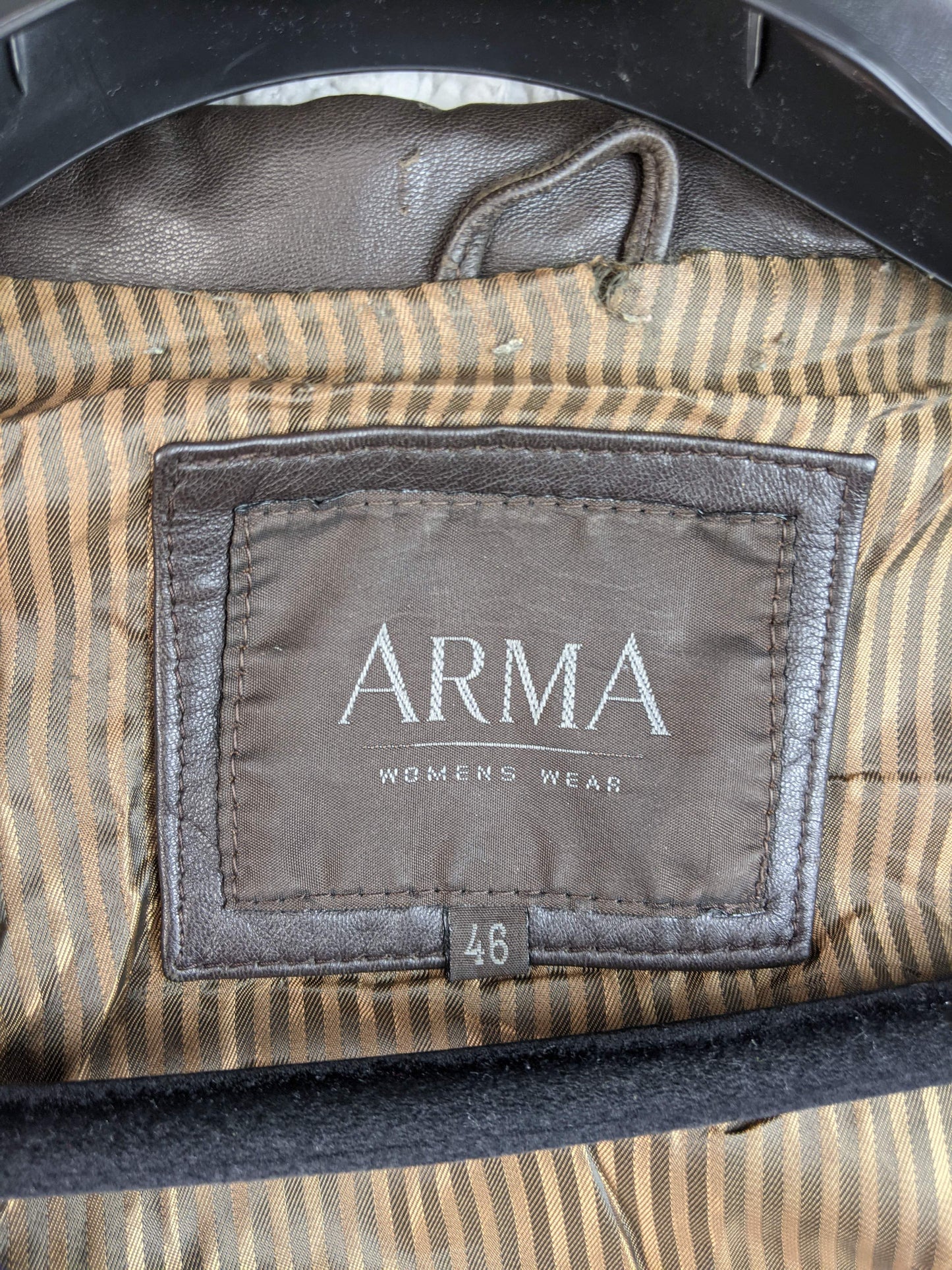 Close-up of Arma brand label inside the jacket