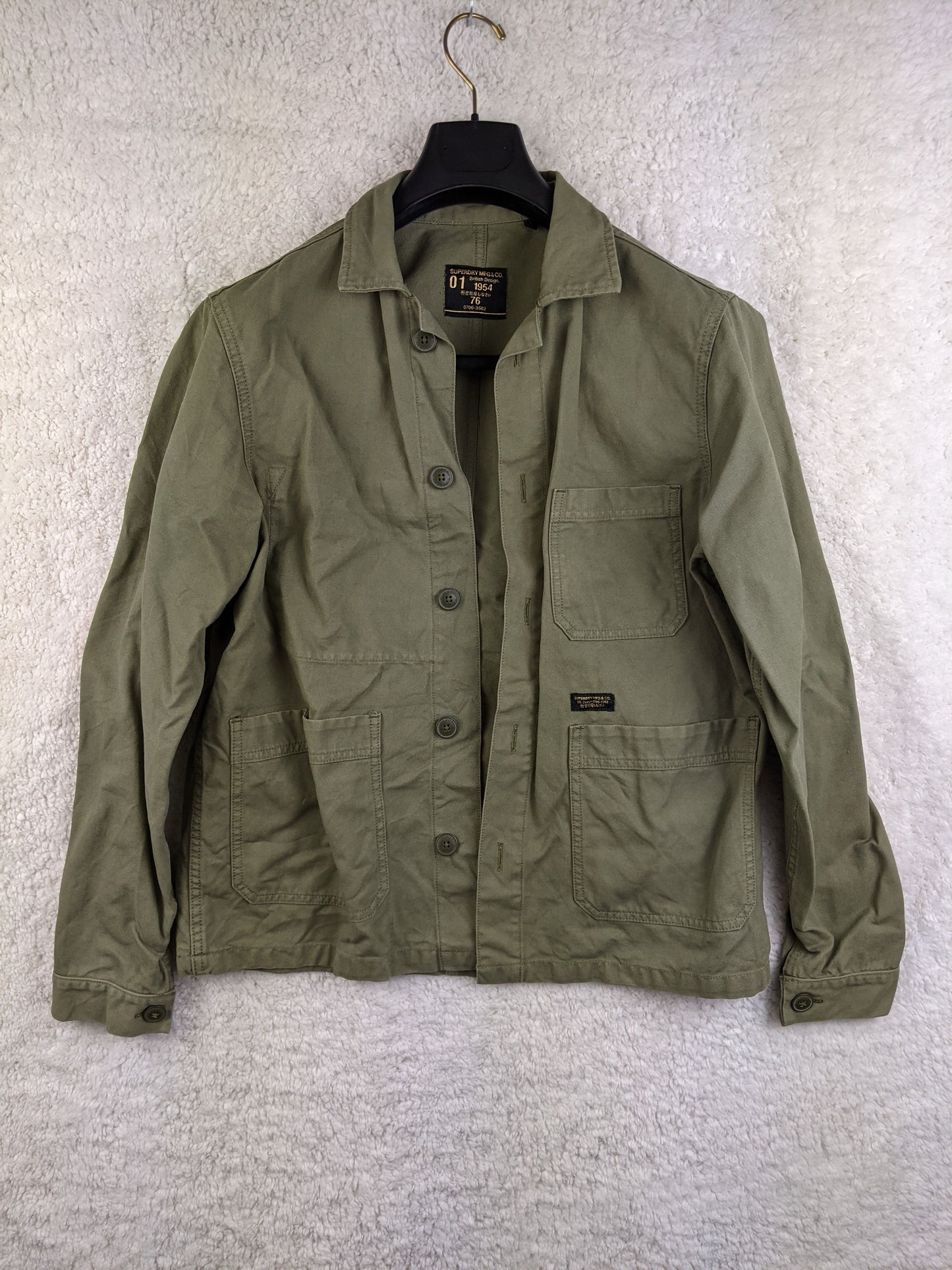 Front view of Superdry olive green workwear jacket