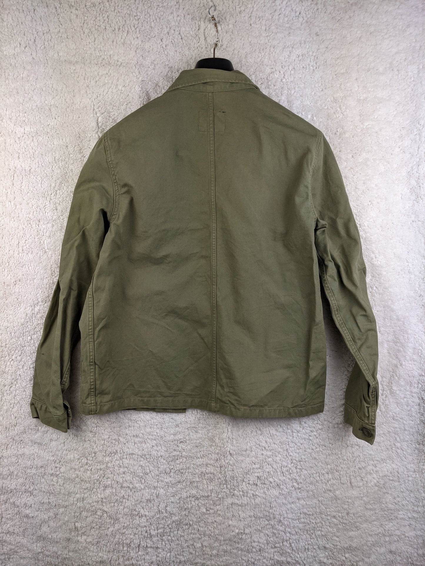 Back view of Superdry olive green workwear jacket