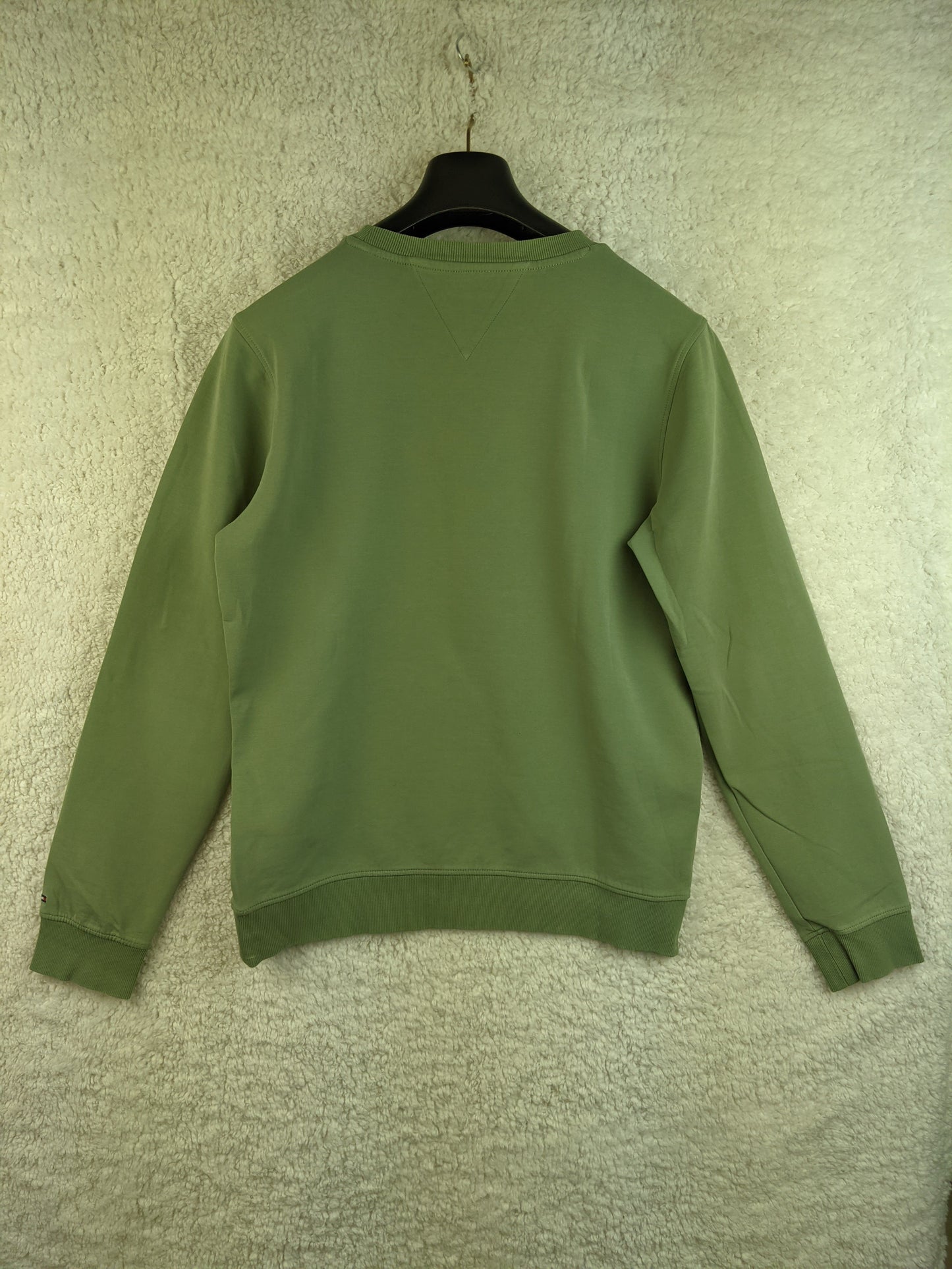Back view of green Tommy Hilfiger sweatshirt