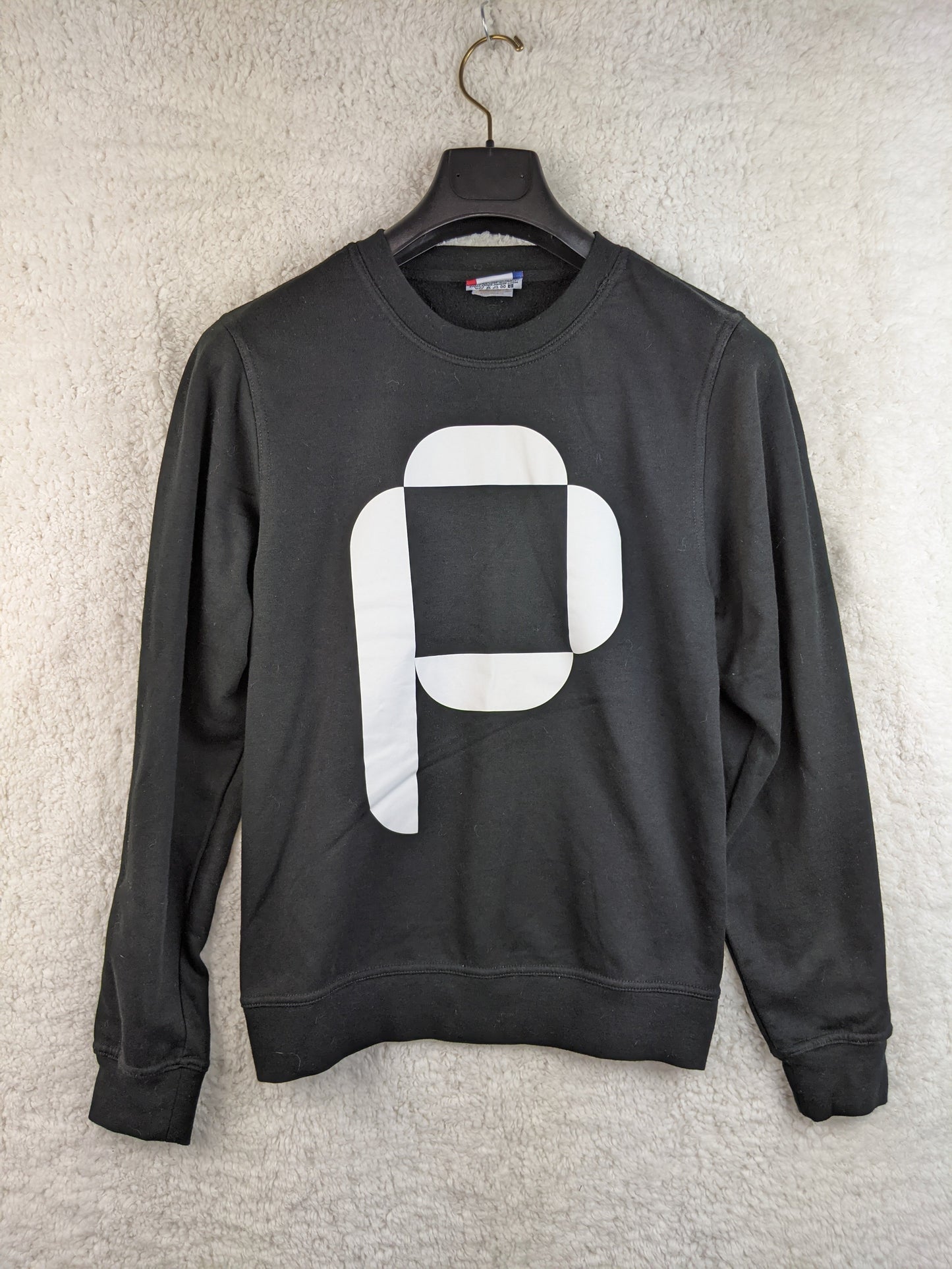 Front view of Clique black graphic sweatshirt