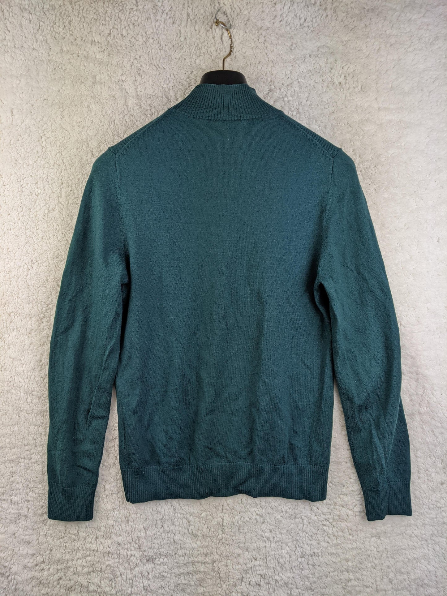 Green wool sweater back view