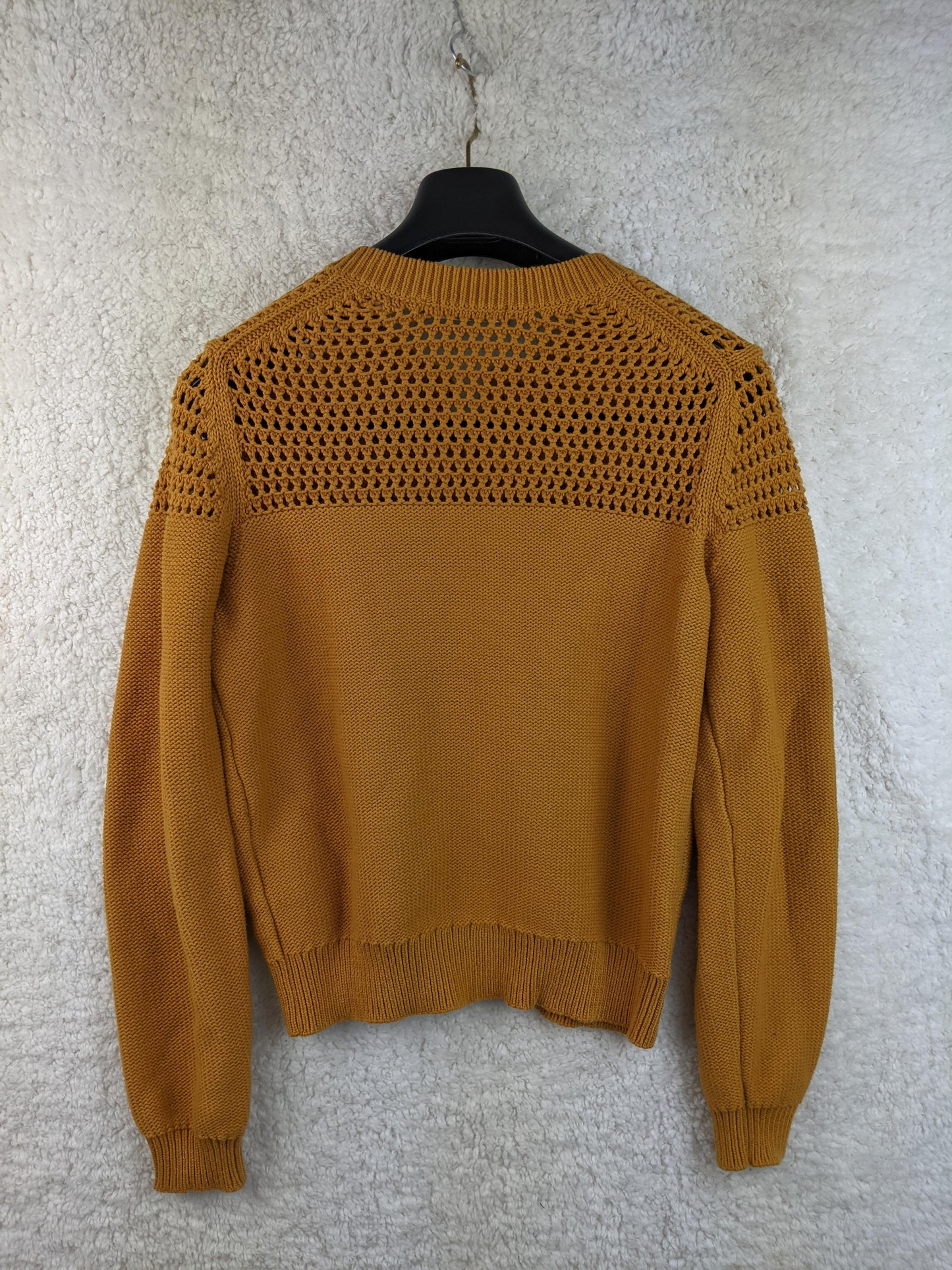 Back view of mustard Uniqlo U cardigan