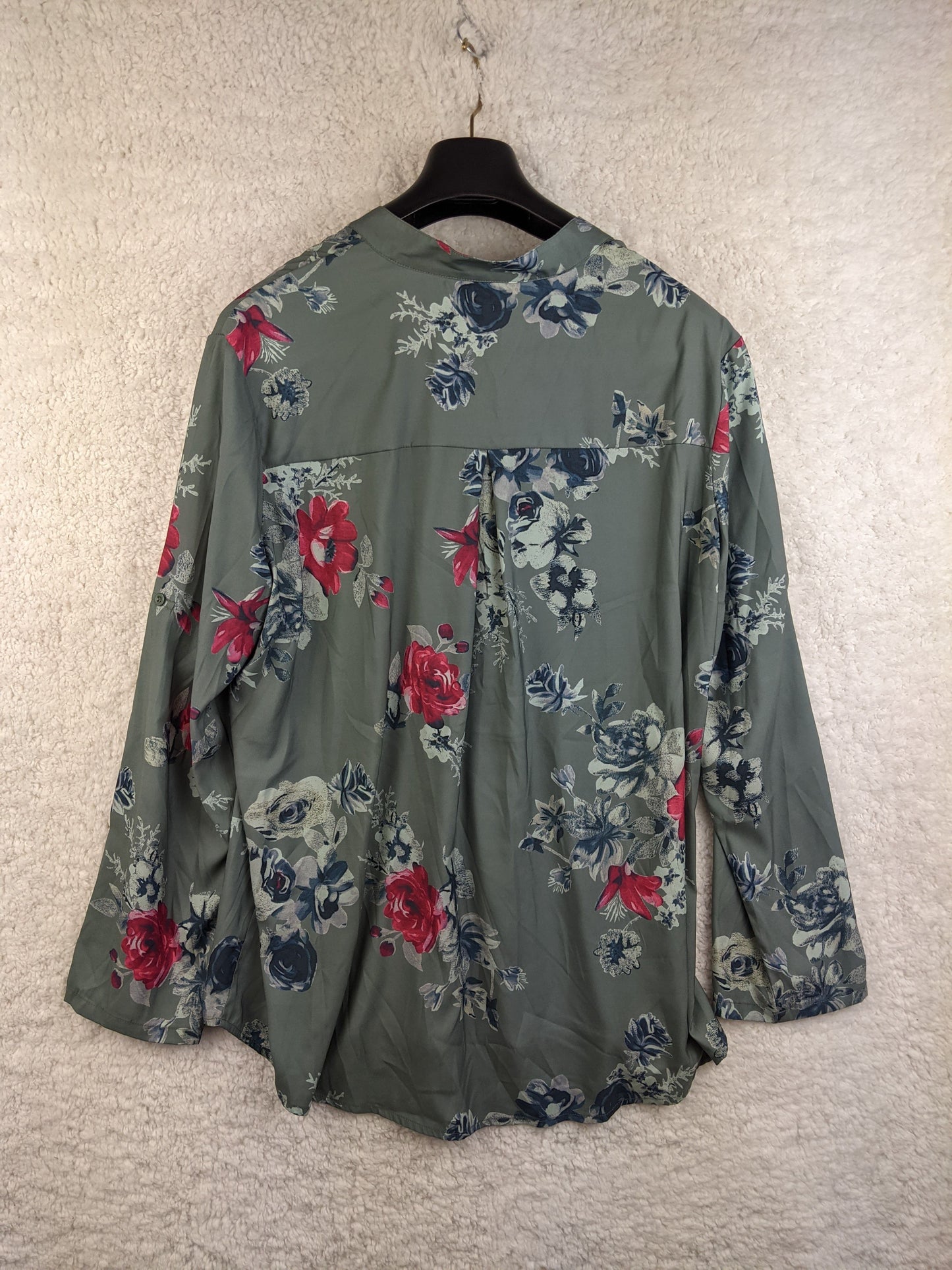 Back view of green floral blouse