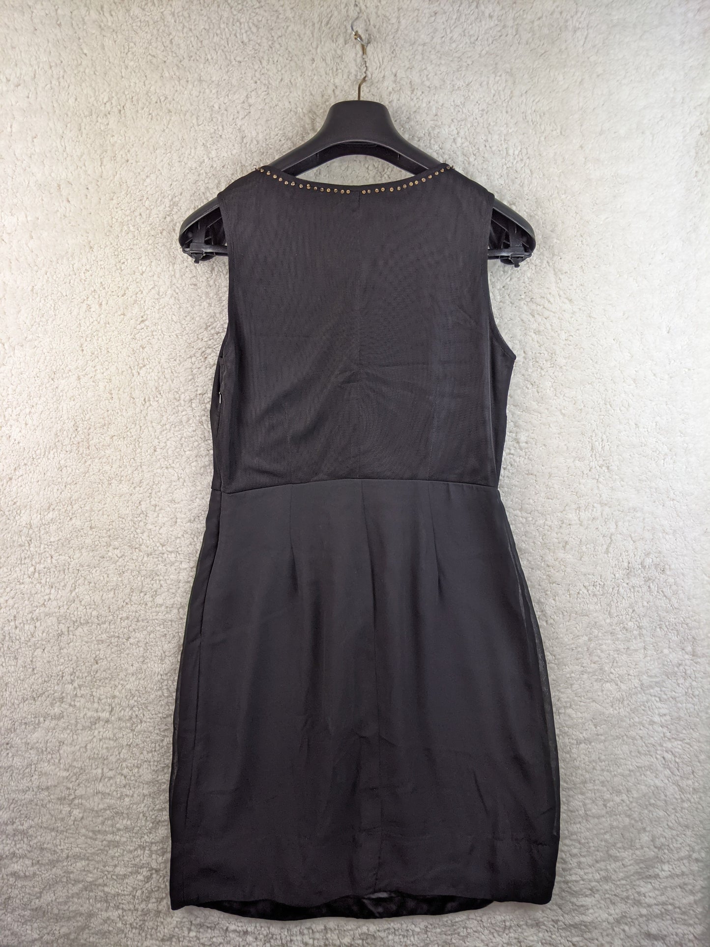 Back view of black embellished dress