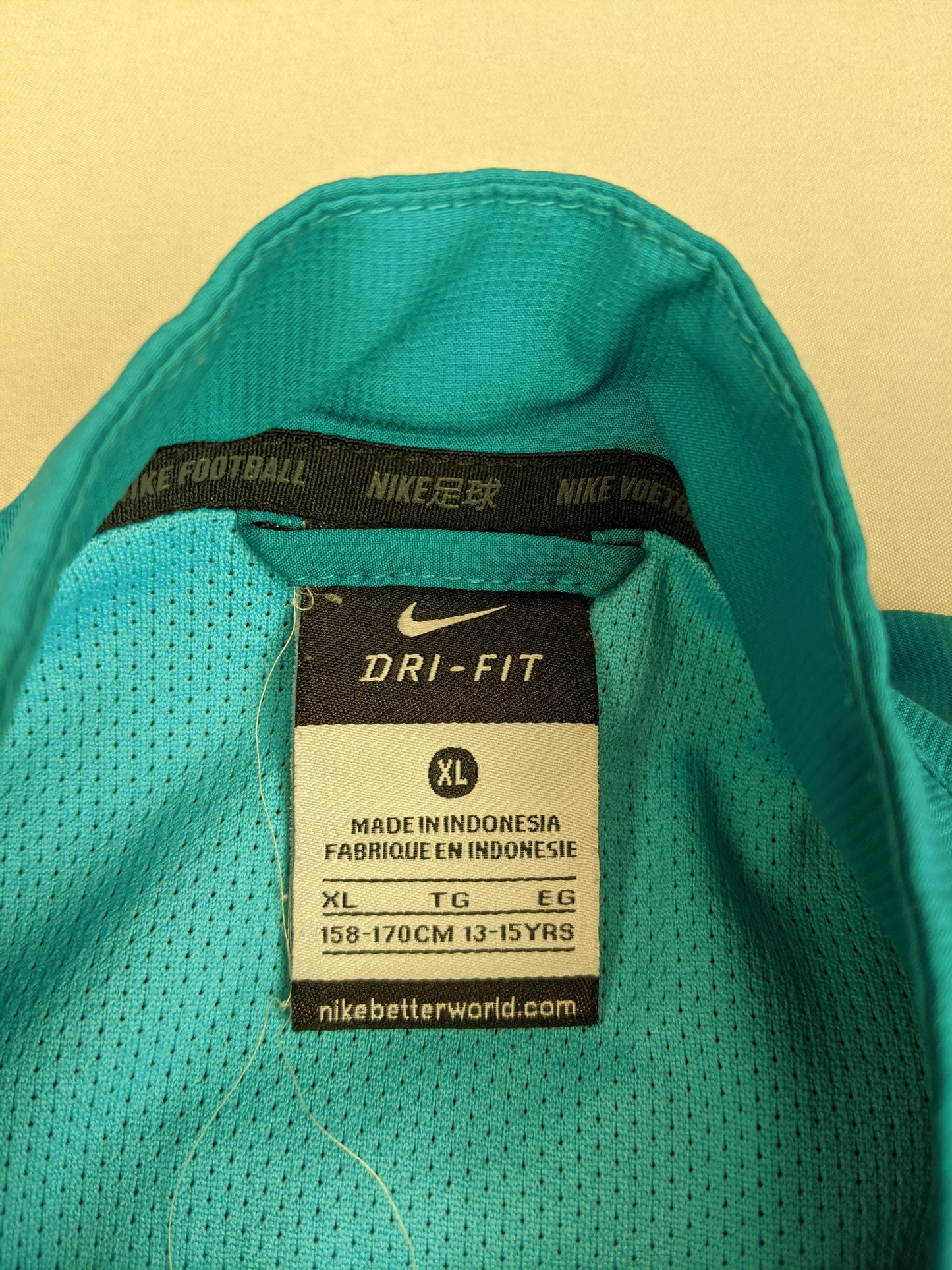 Size label of Nike FC Barcelona track jacket showing XL