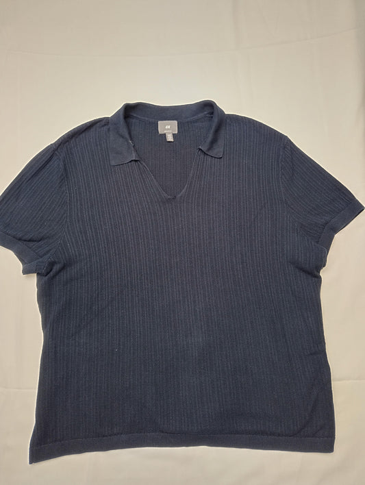 Front view of H&M navy polo shirt