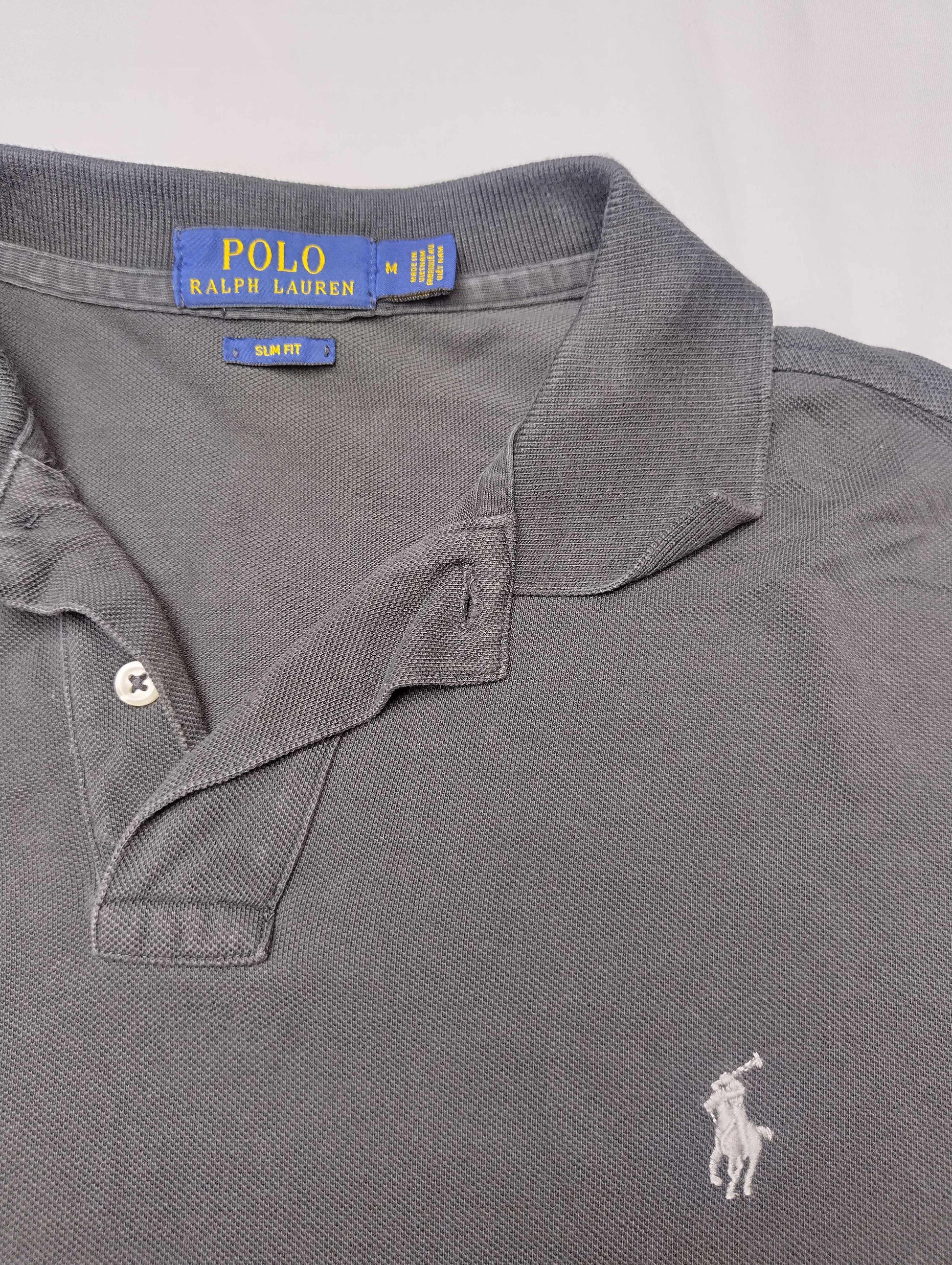 Close-up view of Polo Ralph Lauren label on the shirt