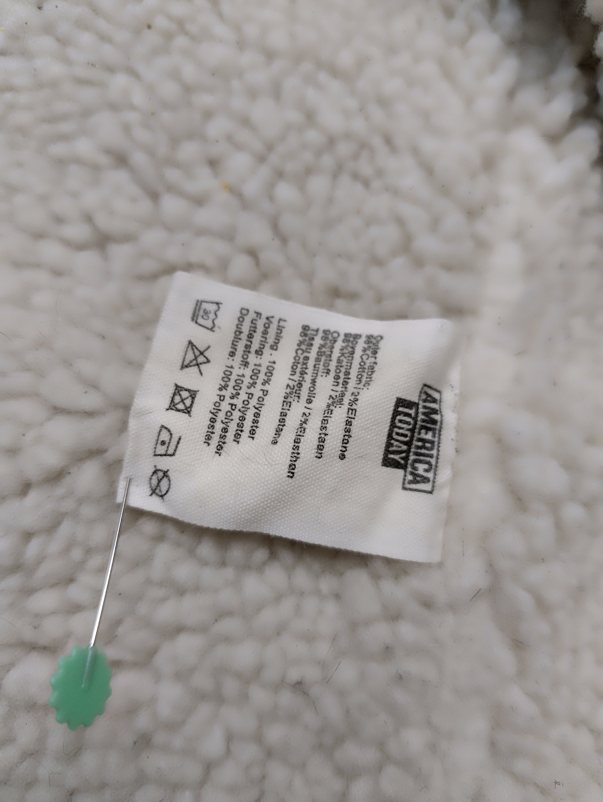 Care instruction tag on the jacket