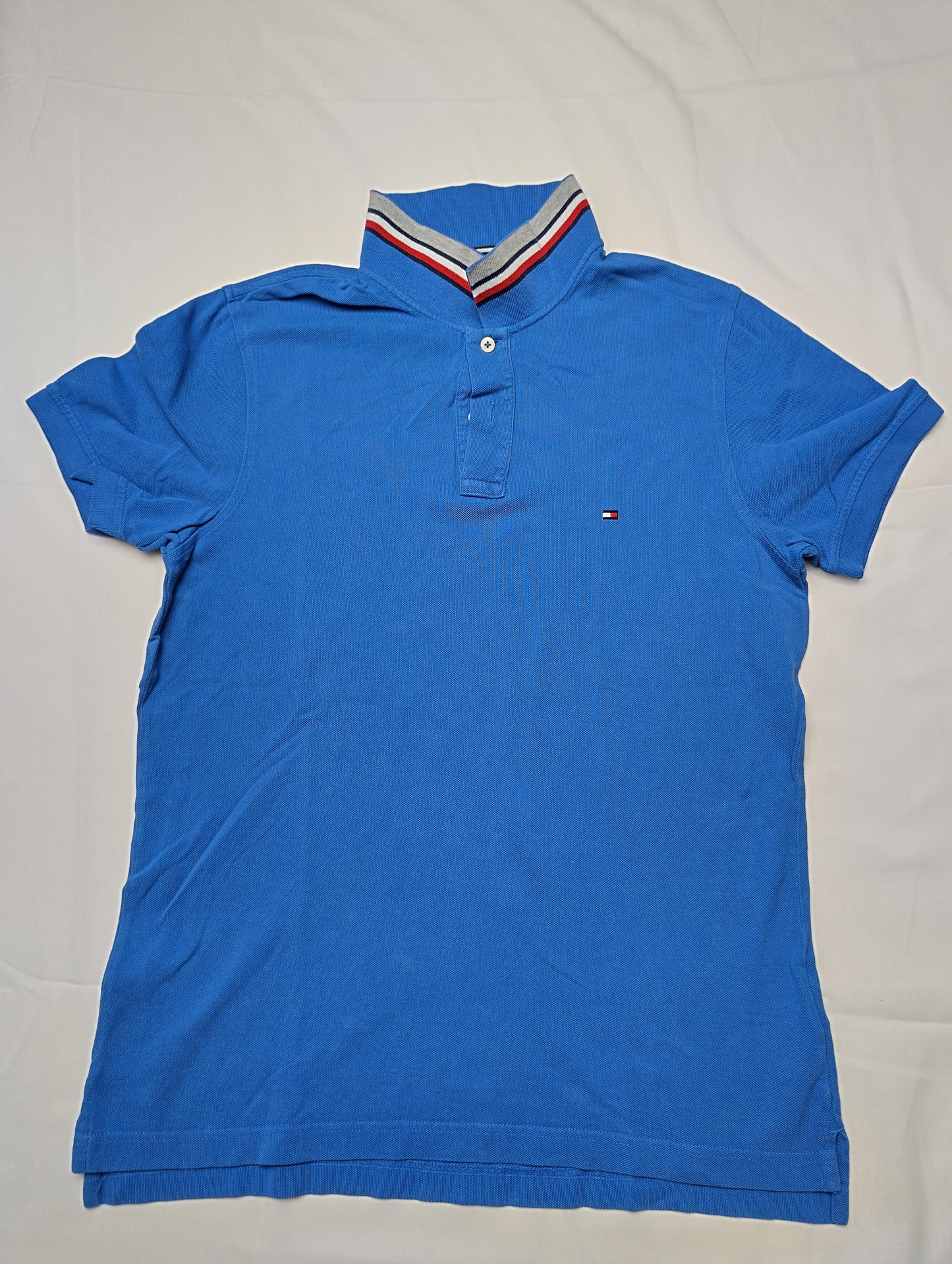 Front view of blue polo shirt