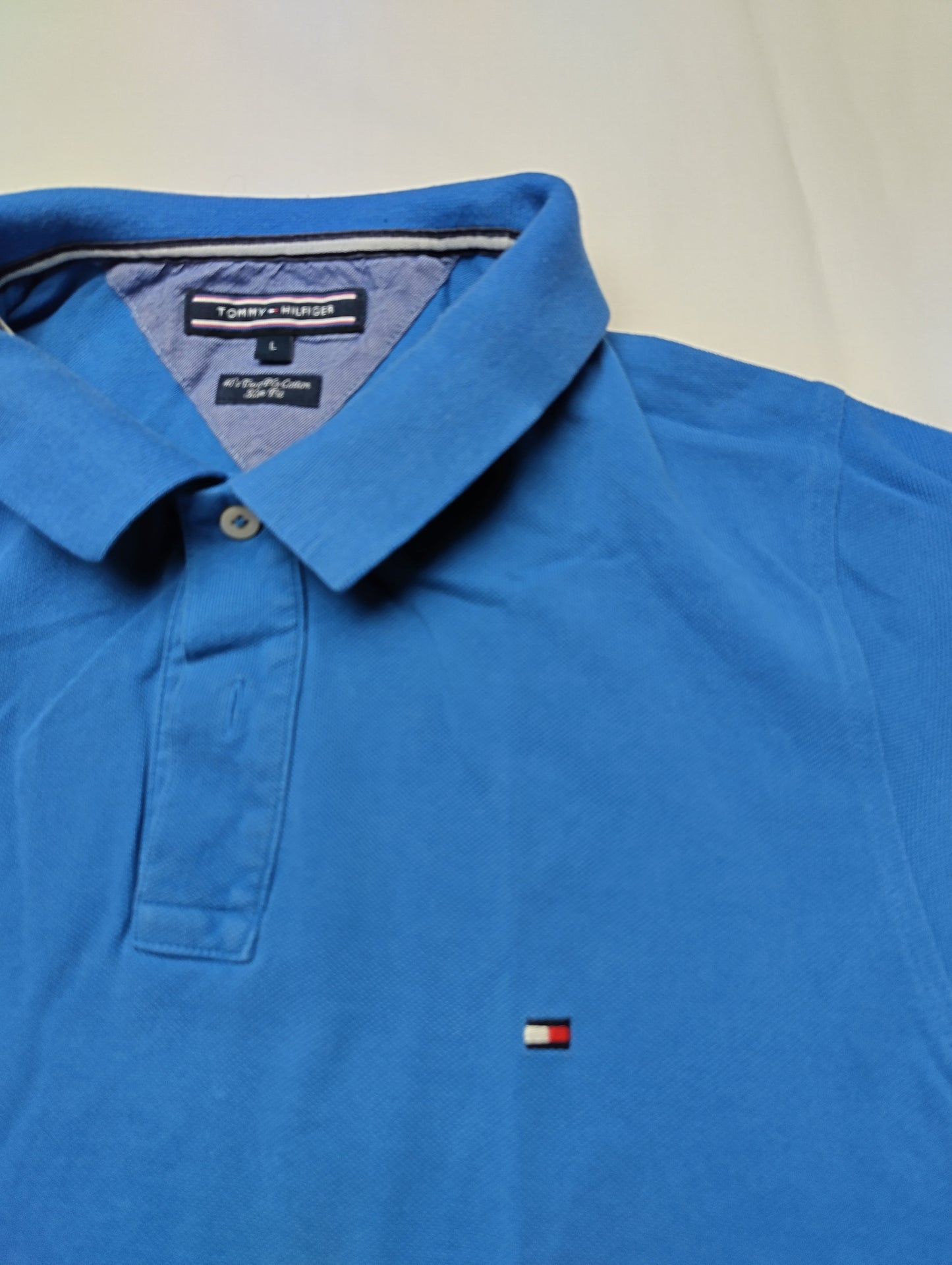 Close-up of collar and brand label
