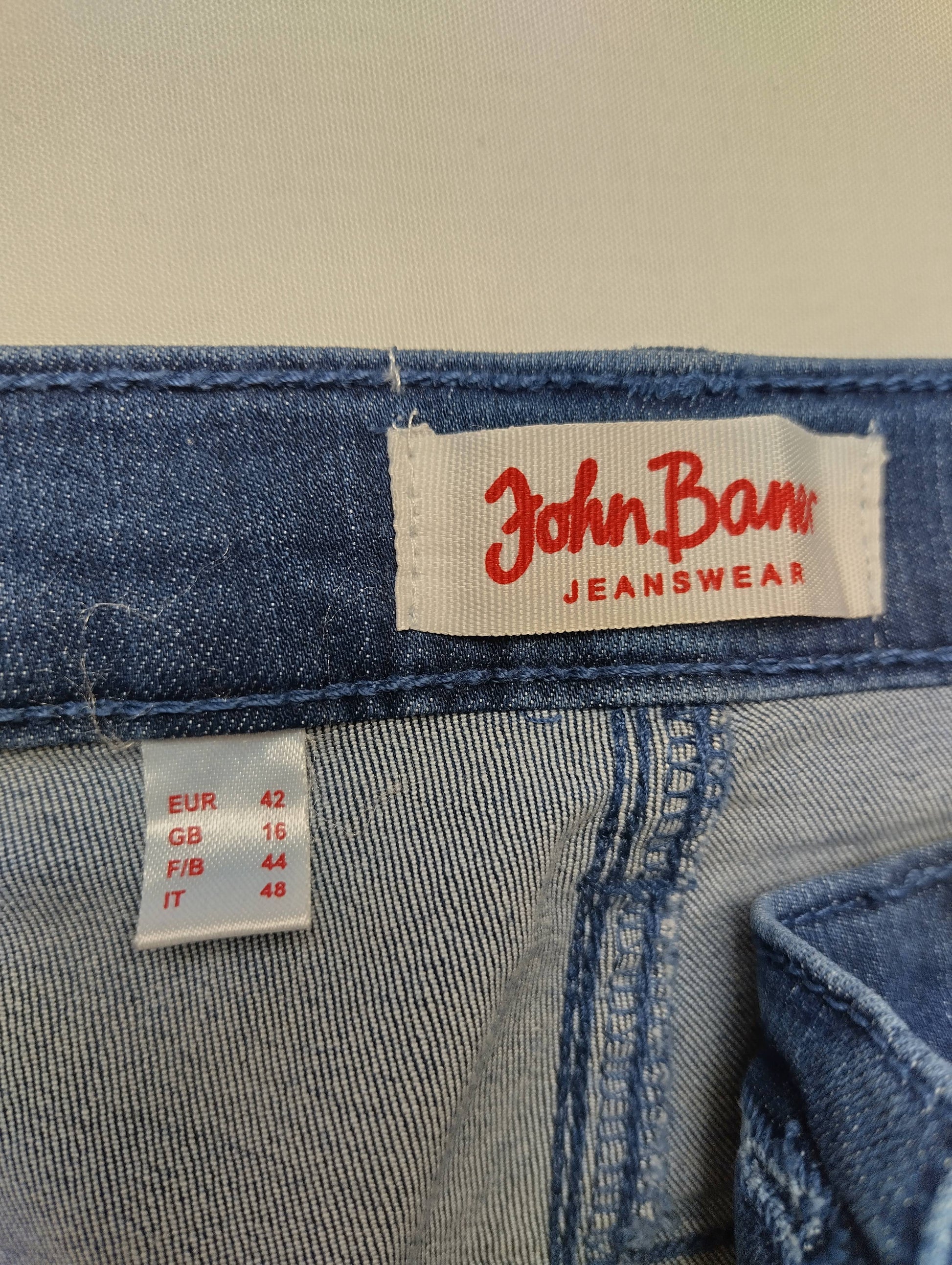 Close-up of size label on jeans