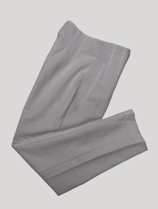 White trousers laying flat on a surface