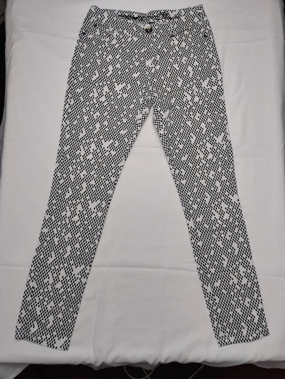 Front view of black and white polka dot pants