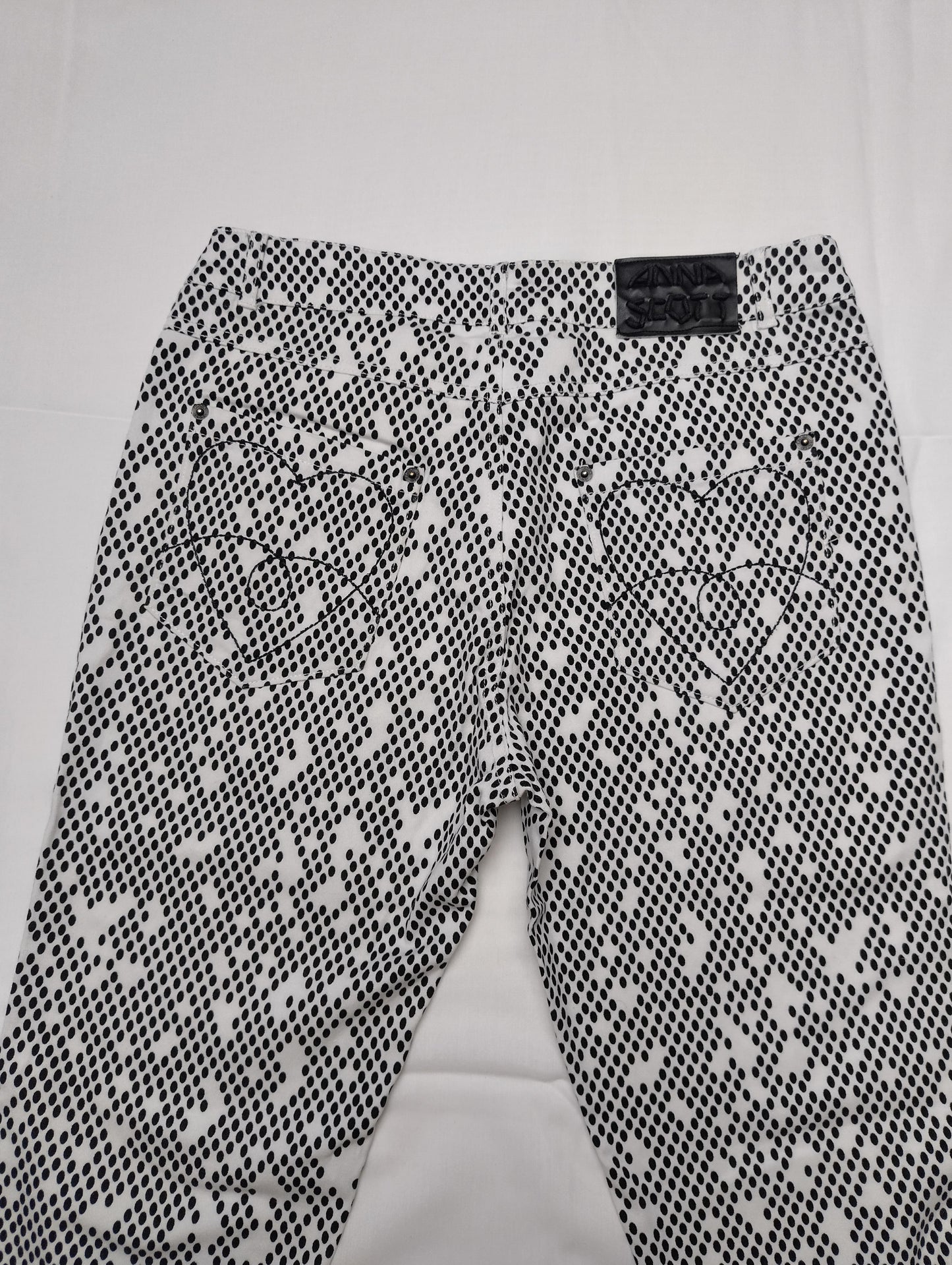 Back view showing heart-shaped embroidery