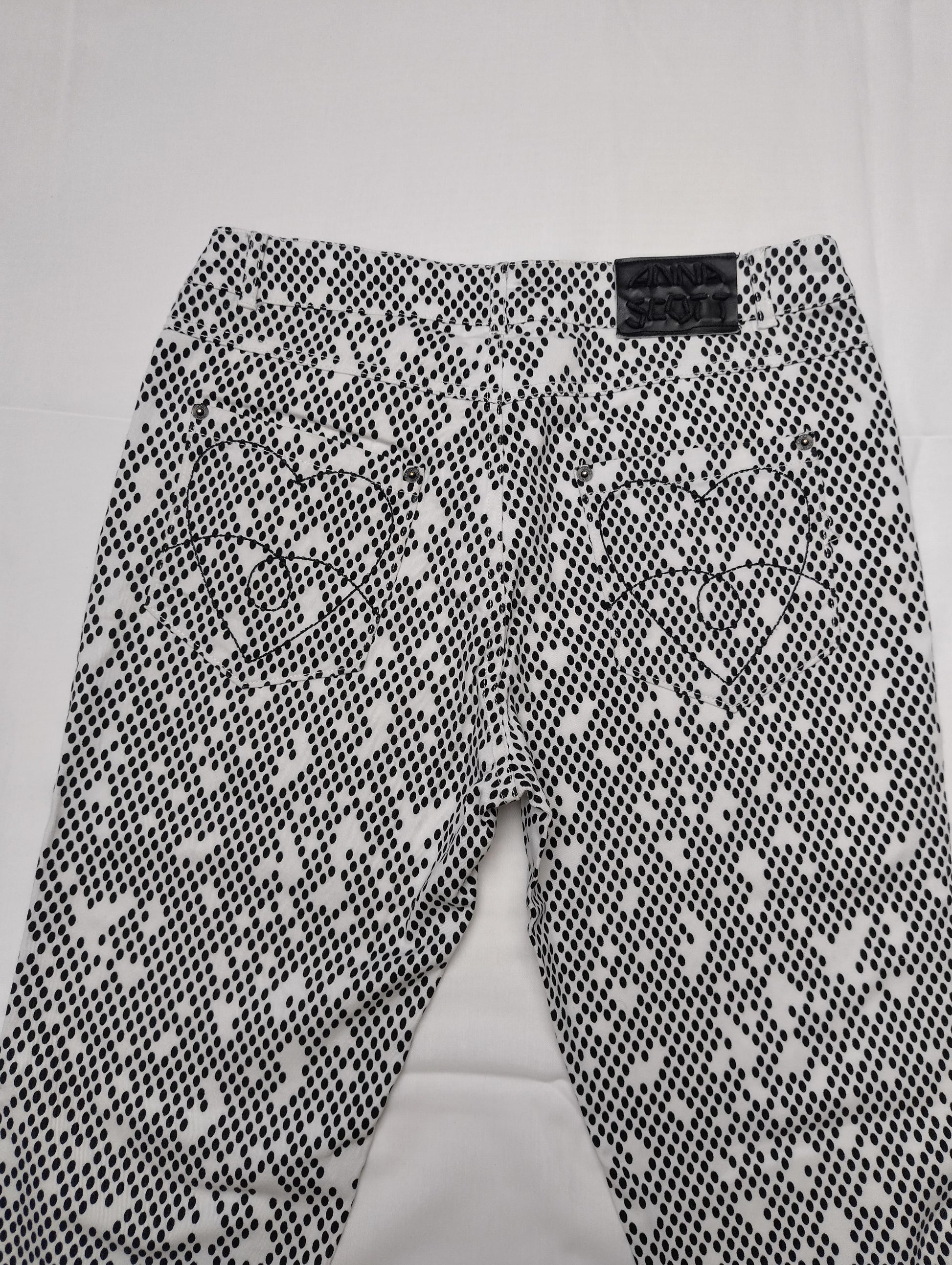 Back view showing heart-shaped embroidery