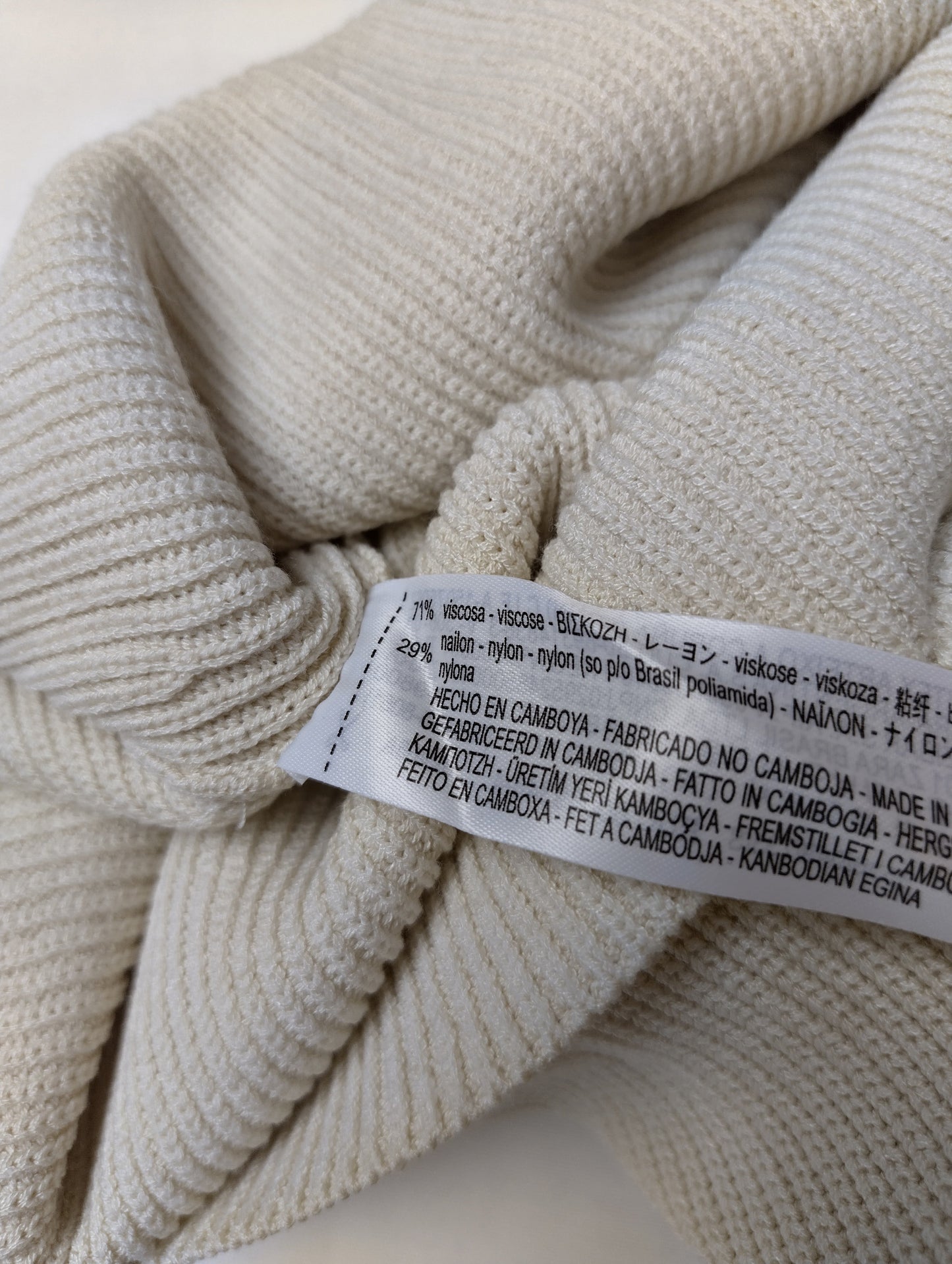 Close-up of fabric content label showing composition