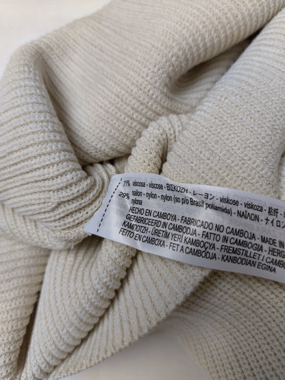 Close-up of fabric content label showing composition