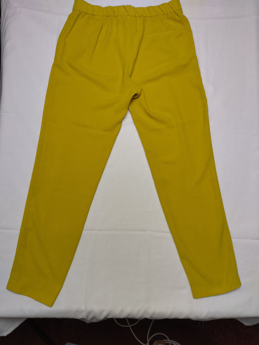 Yellow pants laid flat