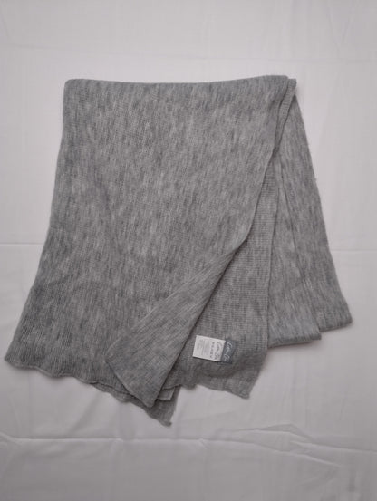 Flat lay of a grey scarf