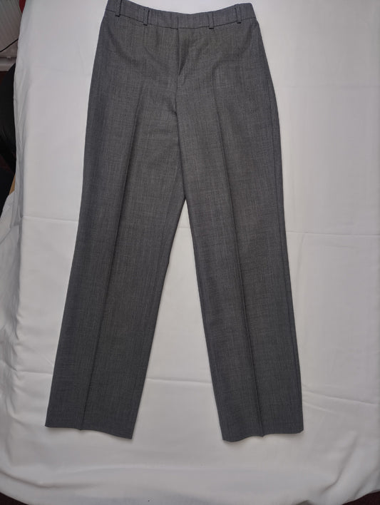 Full view of grey dress pants on a white background