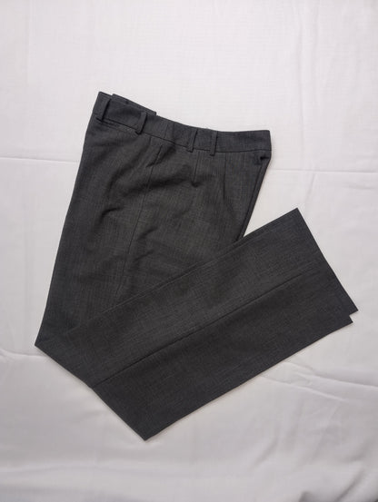 Folded view of grey dress pants