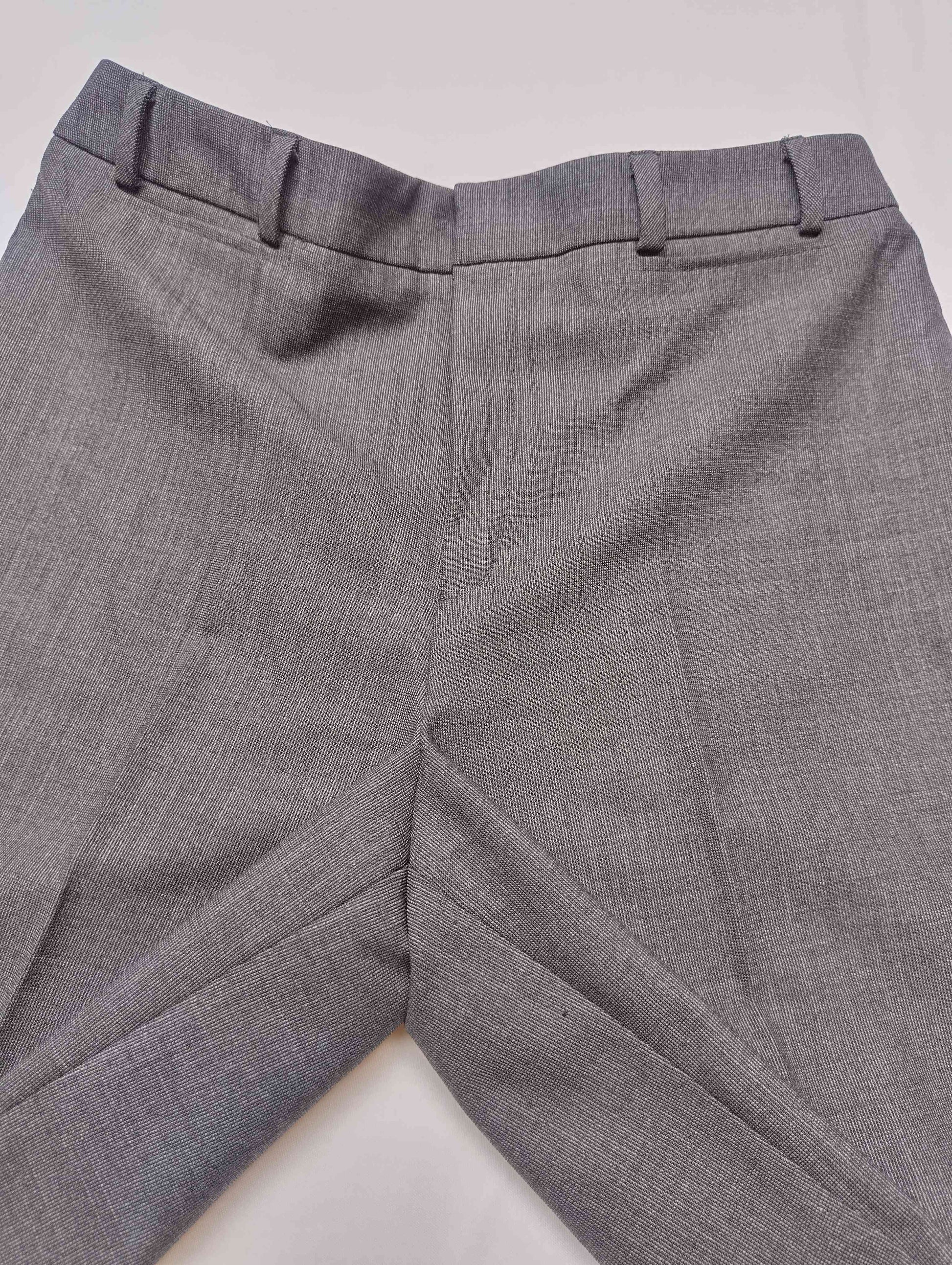 Back view of grey dress pants
