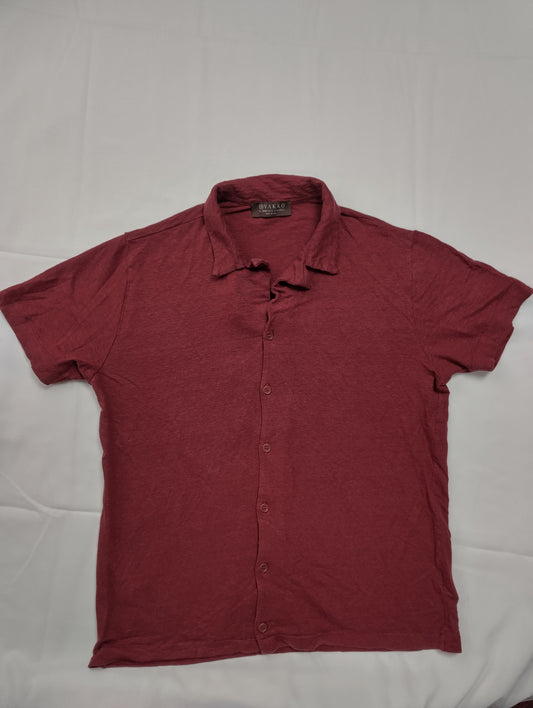 Maroon button-up shirt flat lay