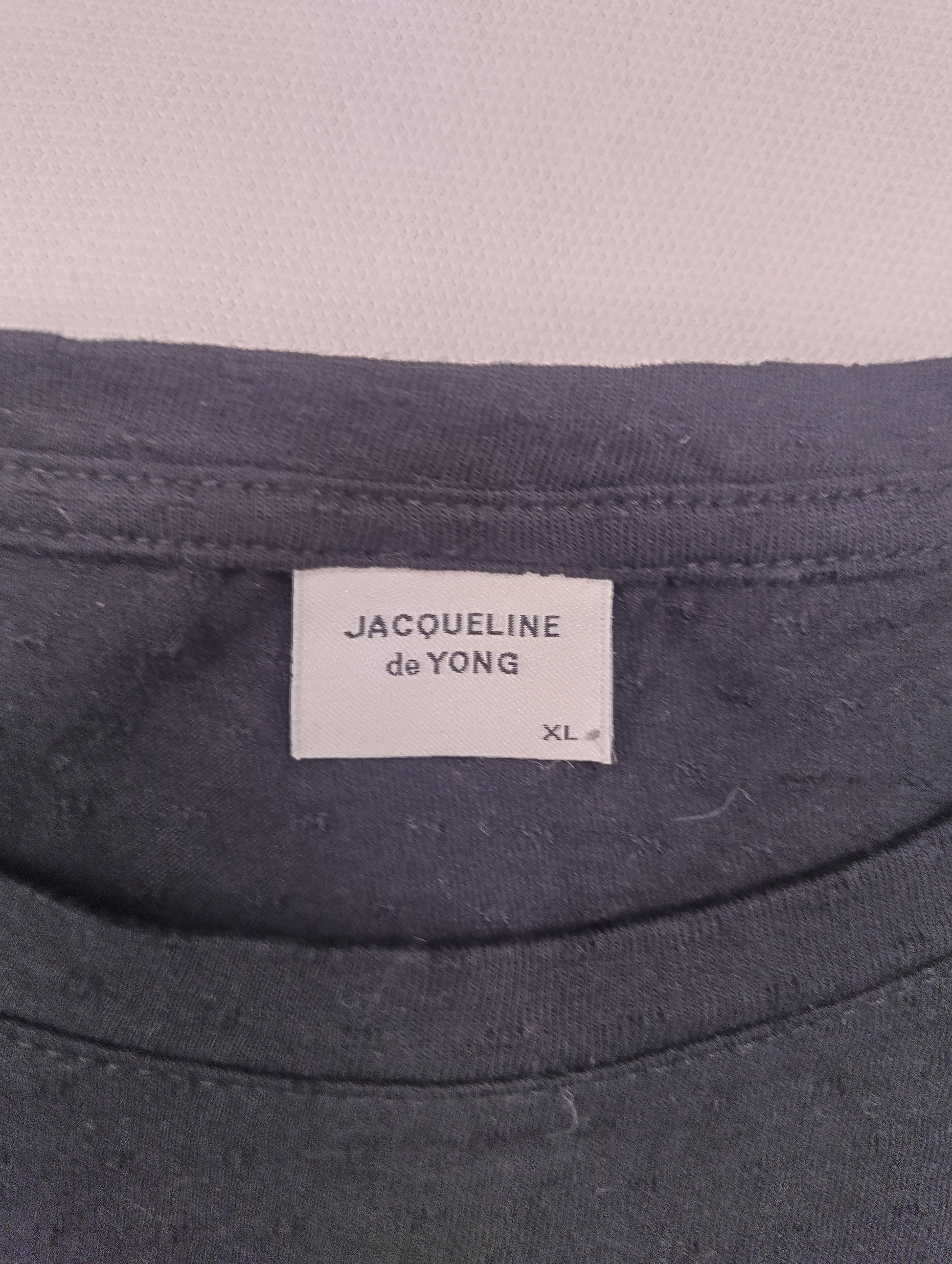 Tag showing brand and size of dress
