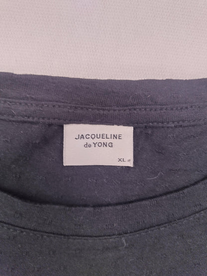 Tag showing brand and size of dress
