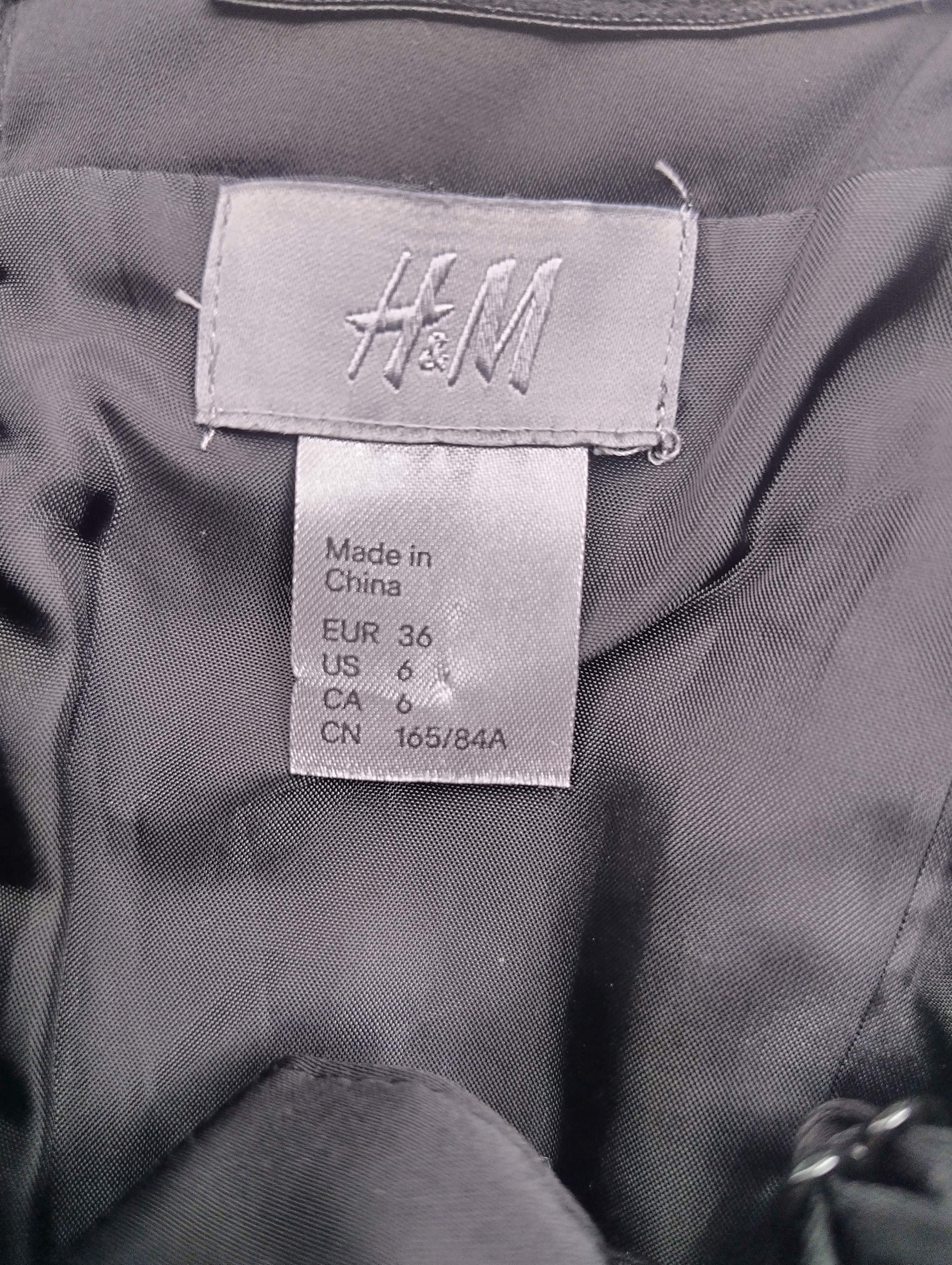 H&M size label on black dress