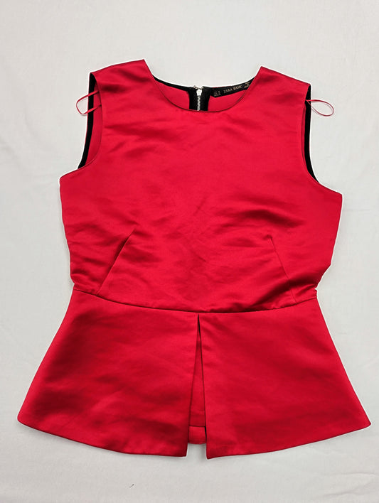 Front view of red peplum top
