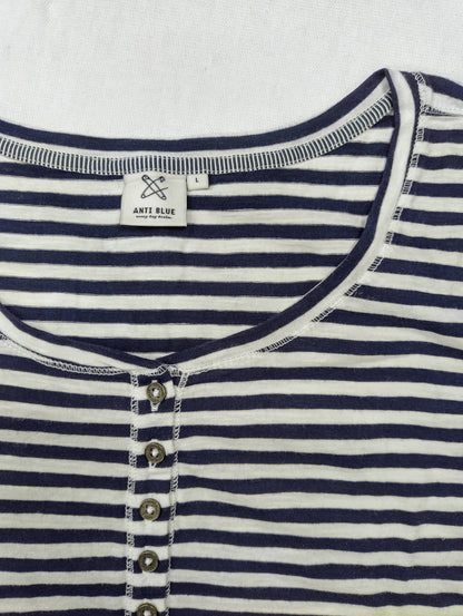 Close-up of neckline and buttons