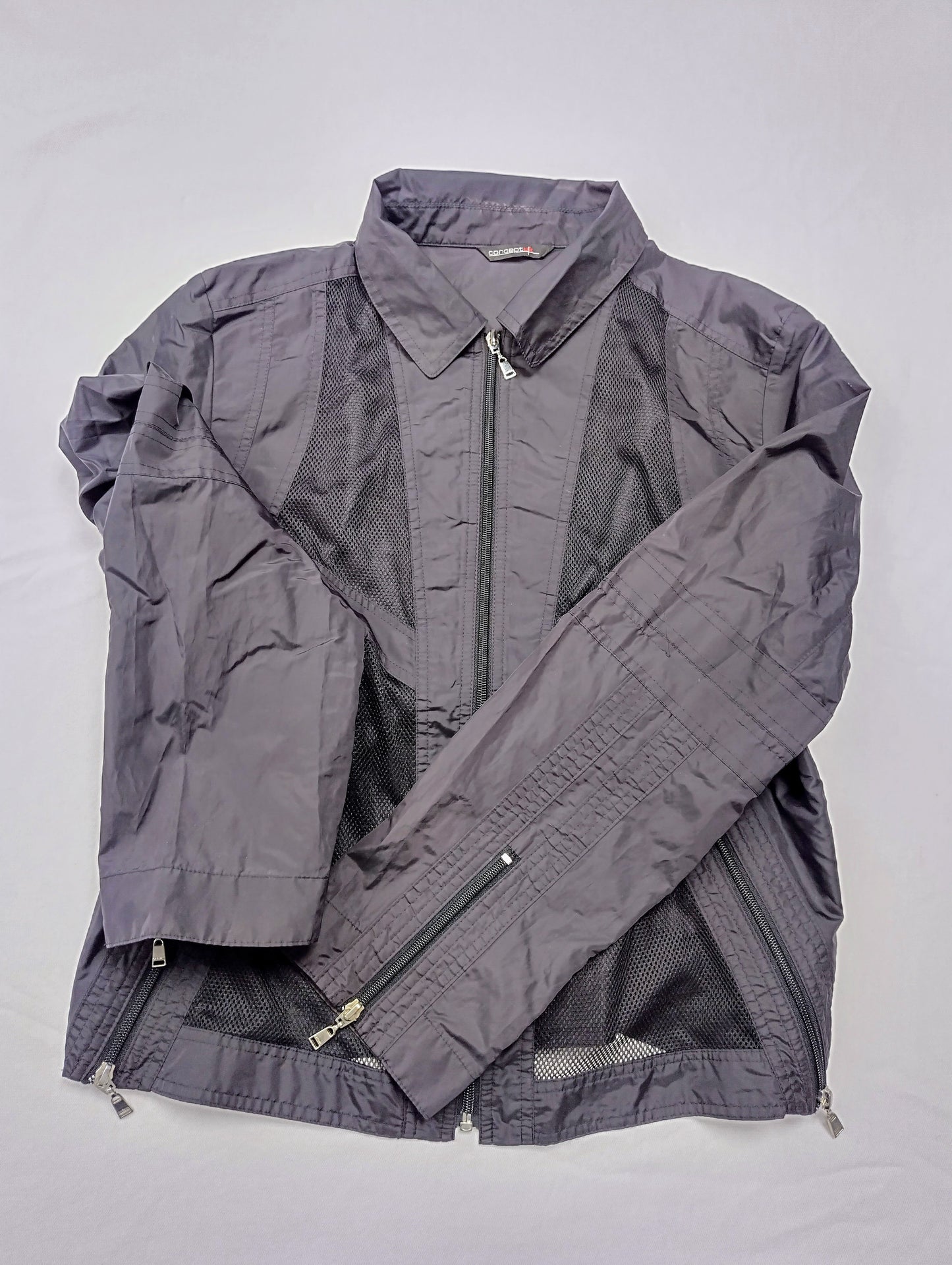 Side view of the black mesh jacket
