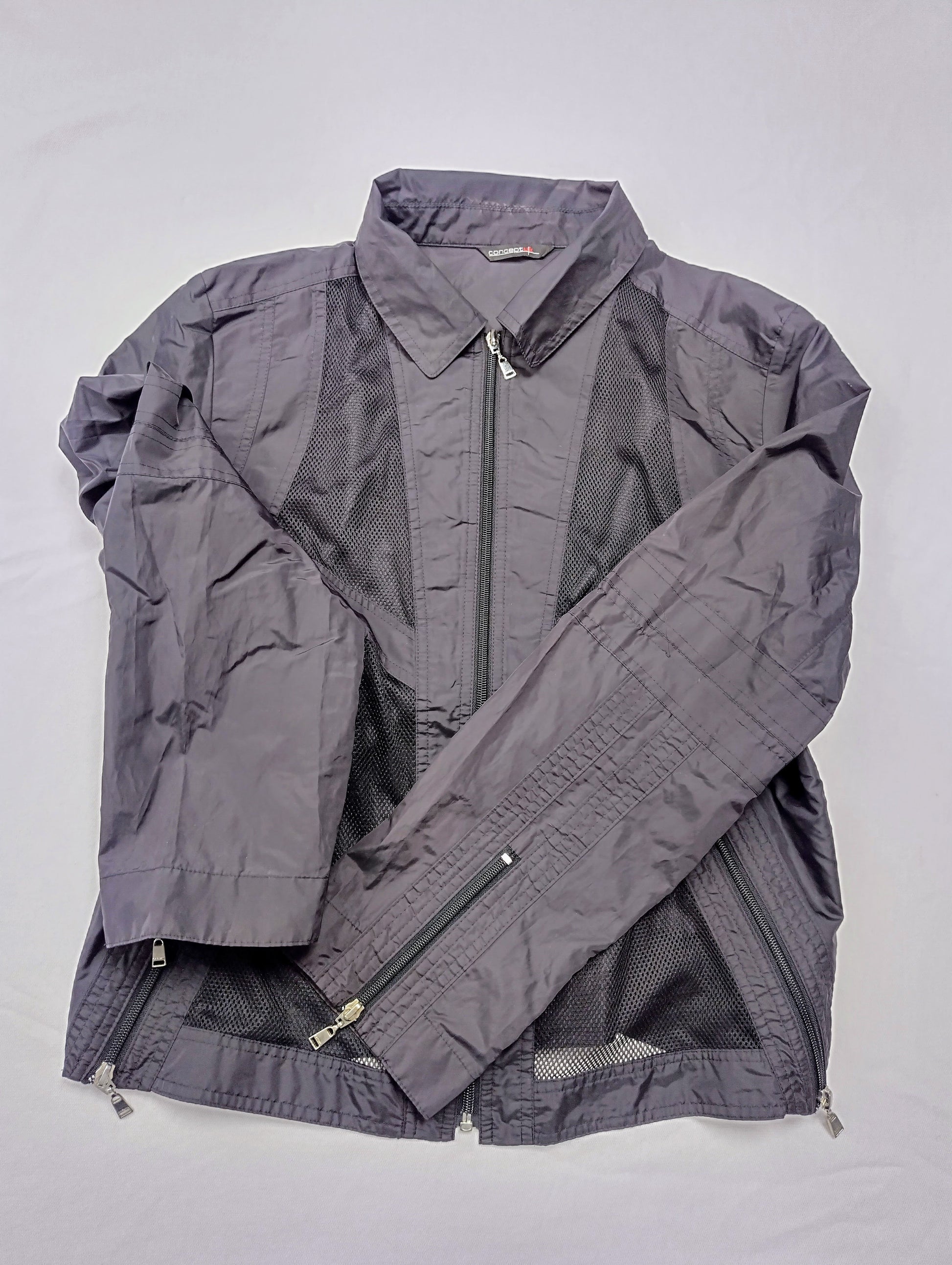 Side view of the black mesh jacket