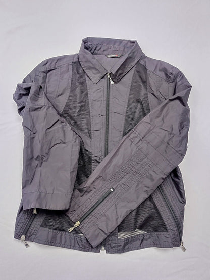 Side view of the black mesh jacket