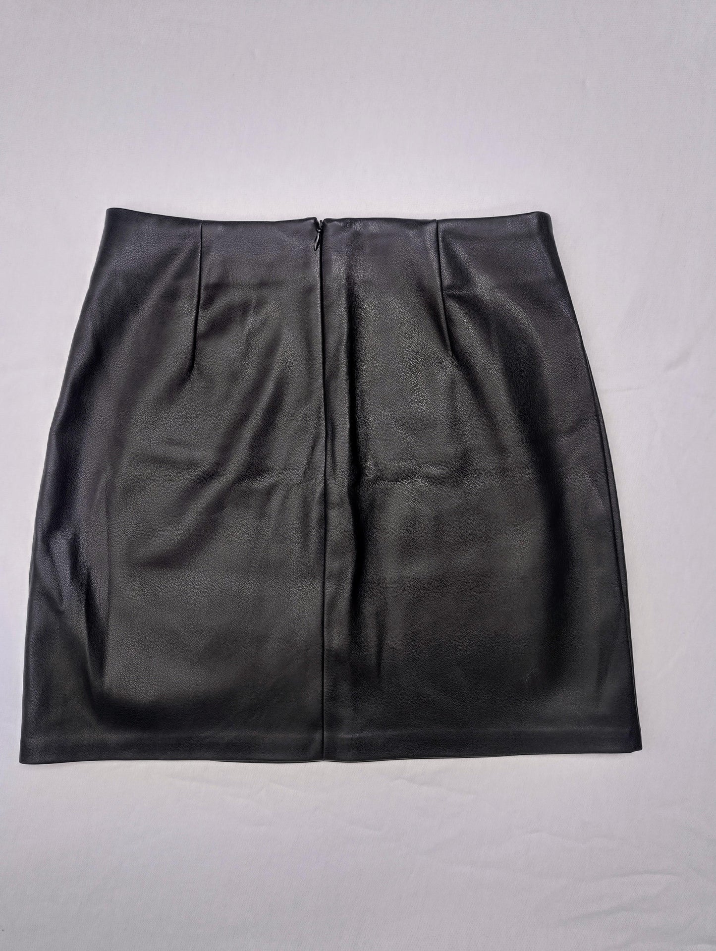 Black faux leather skirt front view