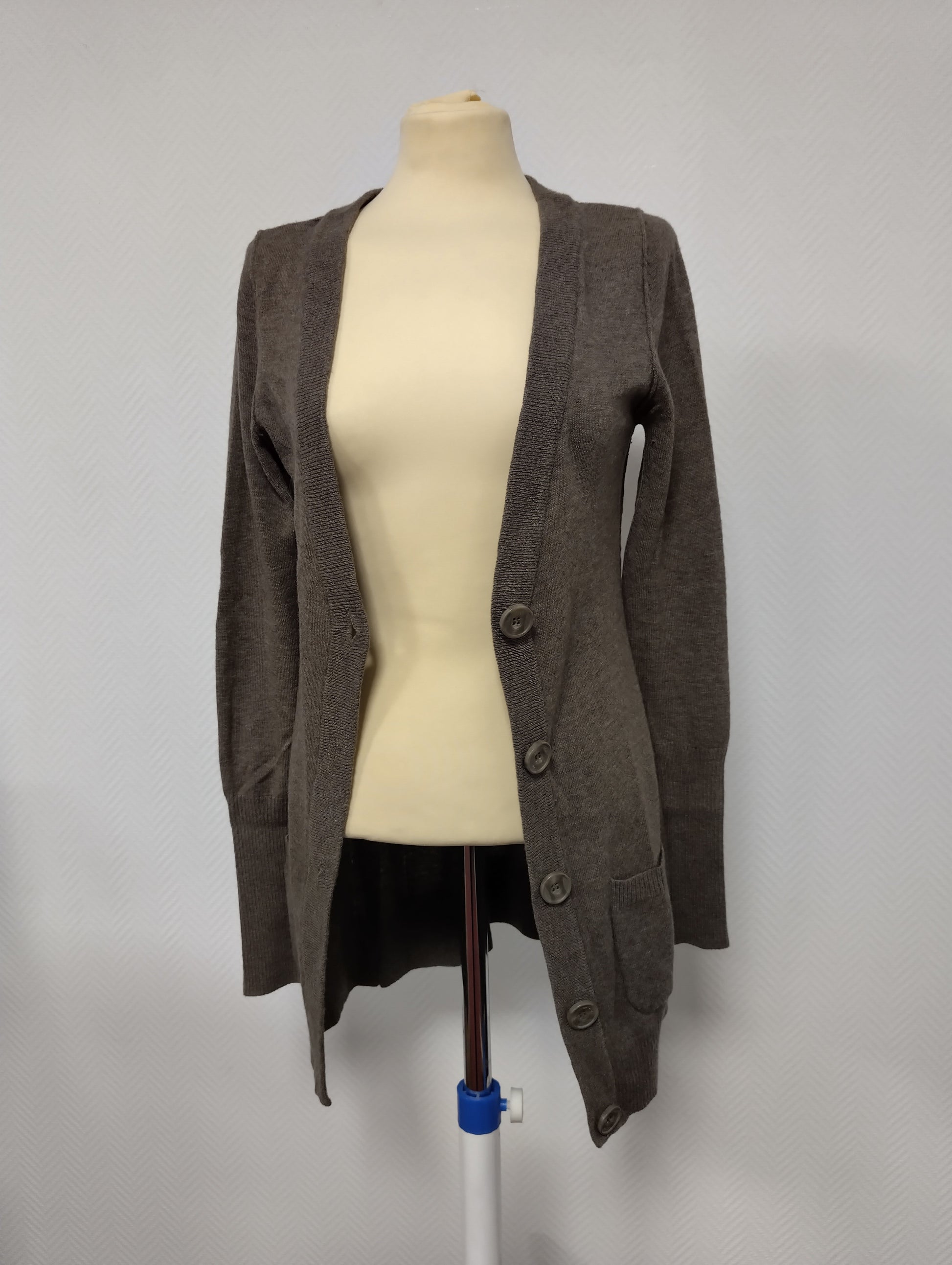 Side view of a cozy brown cardigan