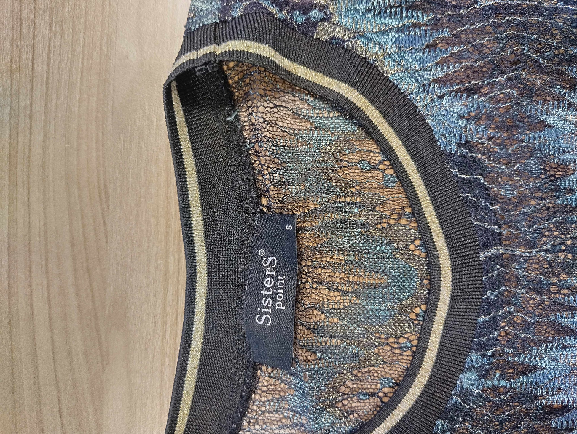 Label inside lace top